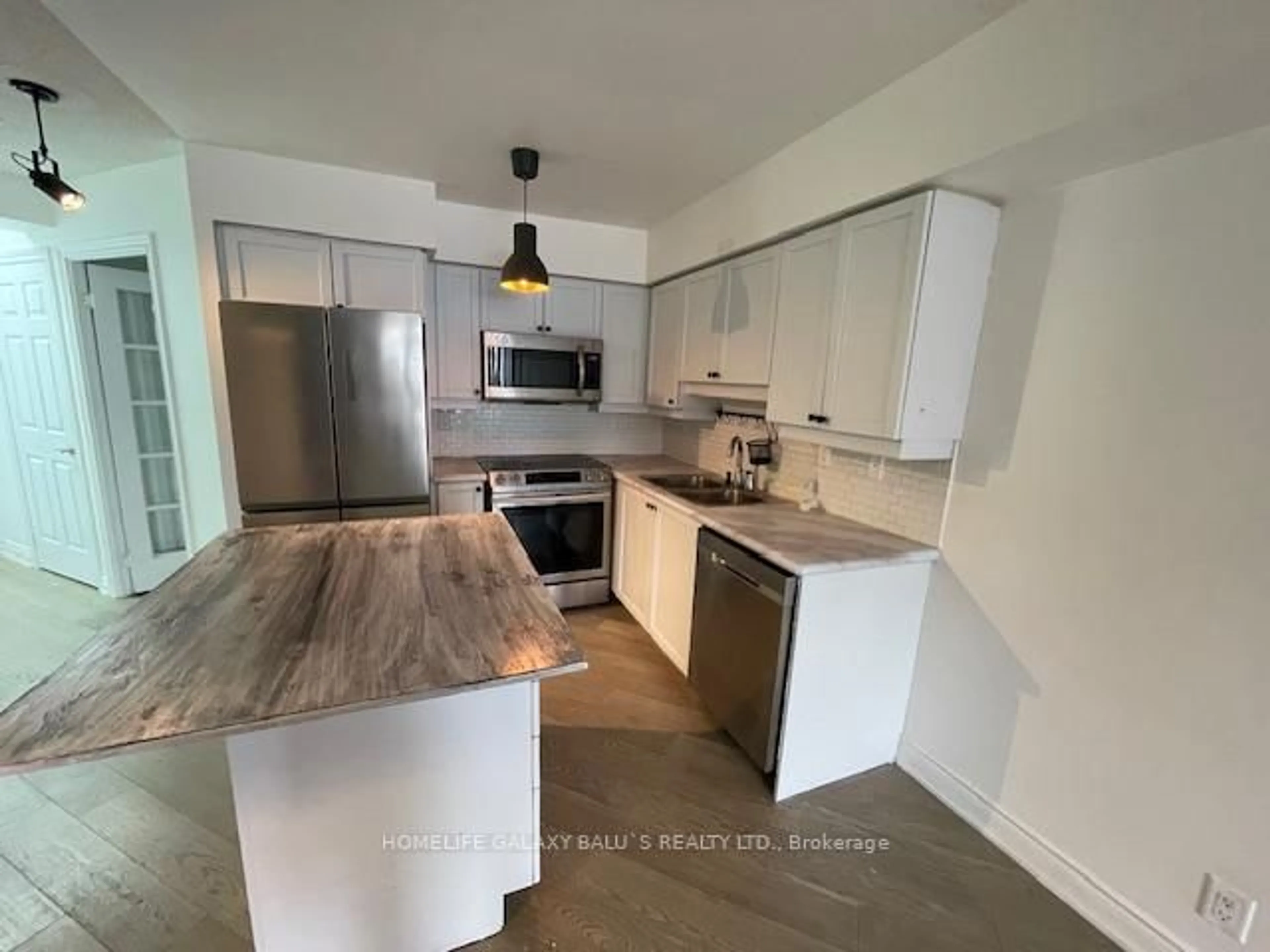 Open concept kitchen, wood/laminate floor for 78 Harrison Garden Blvd #1001, Toronto Ontario M2N 7E2