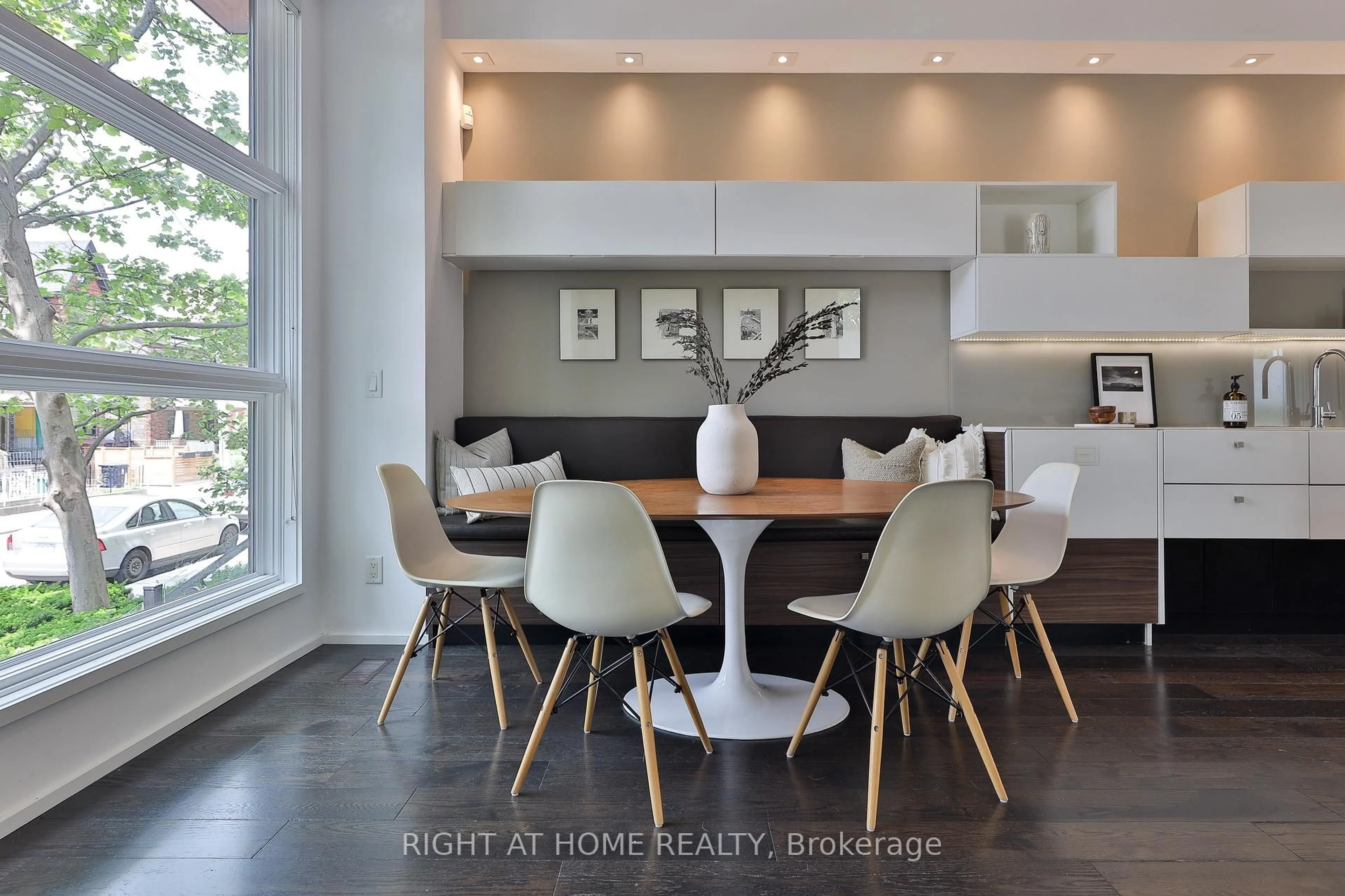 Dining room, wood/laminate floor for 207 Claremont St, Toronto Ontario M6J 2N1