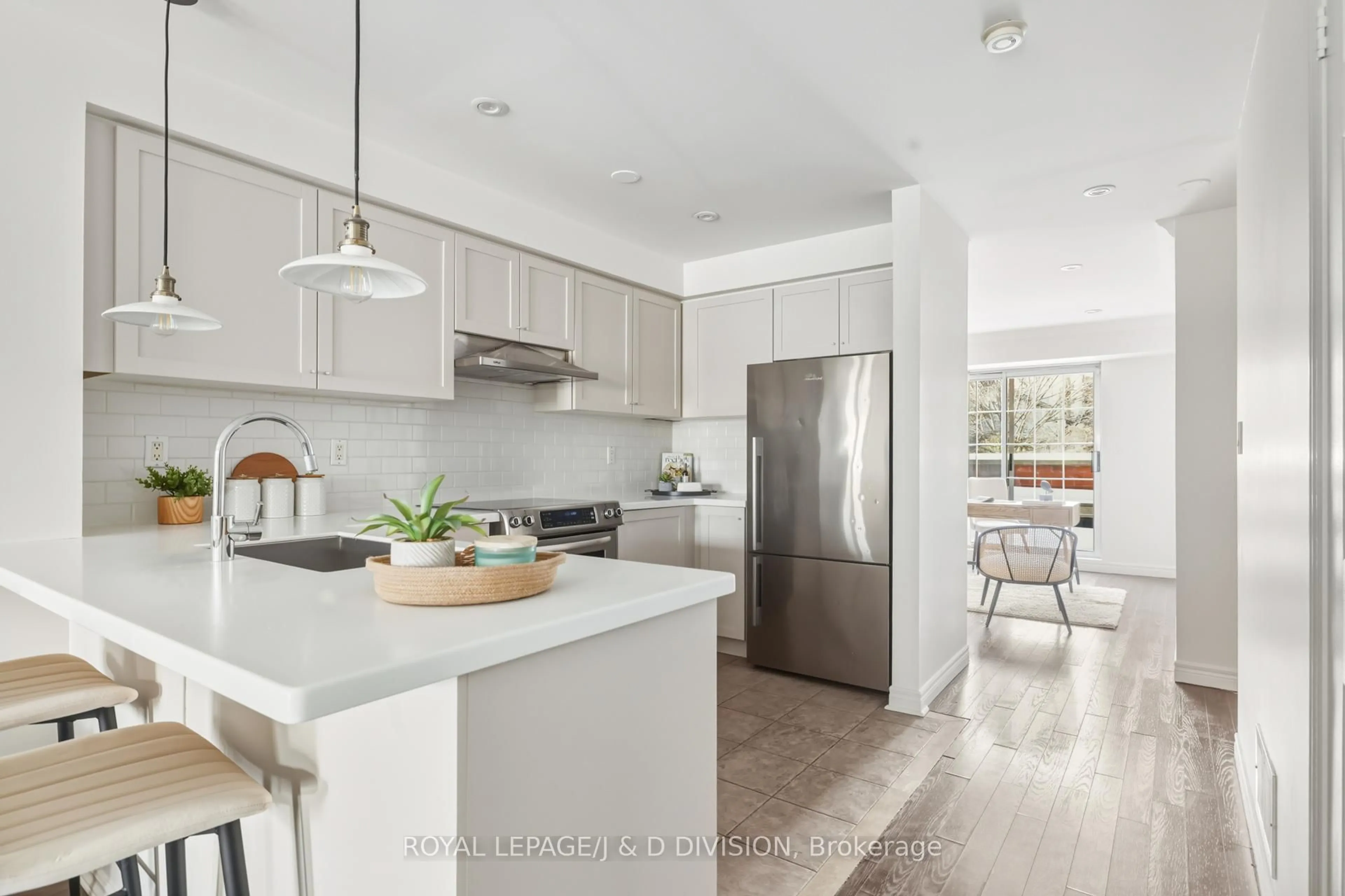 Open concept kitchen, ceramic/tile floor for 120 Strachan Ave #1, Toronto Ontario M6J 3S9