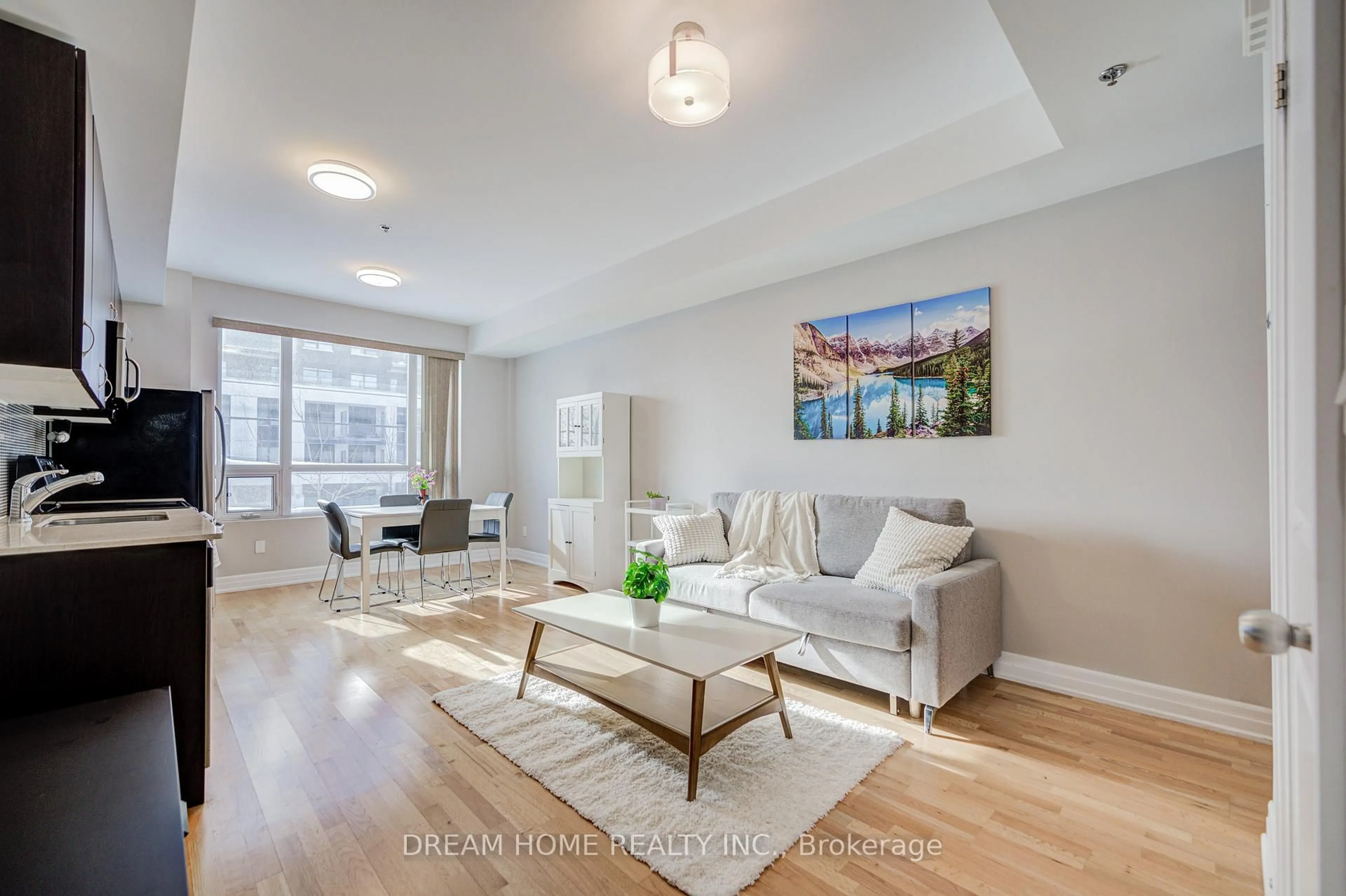 Living room with furniture, wood/laminate floor for 724 Sheppard Ave #201, Toronto Ontario M3H 2S8