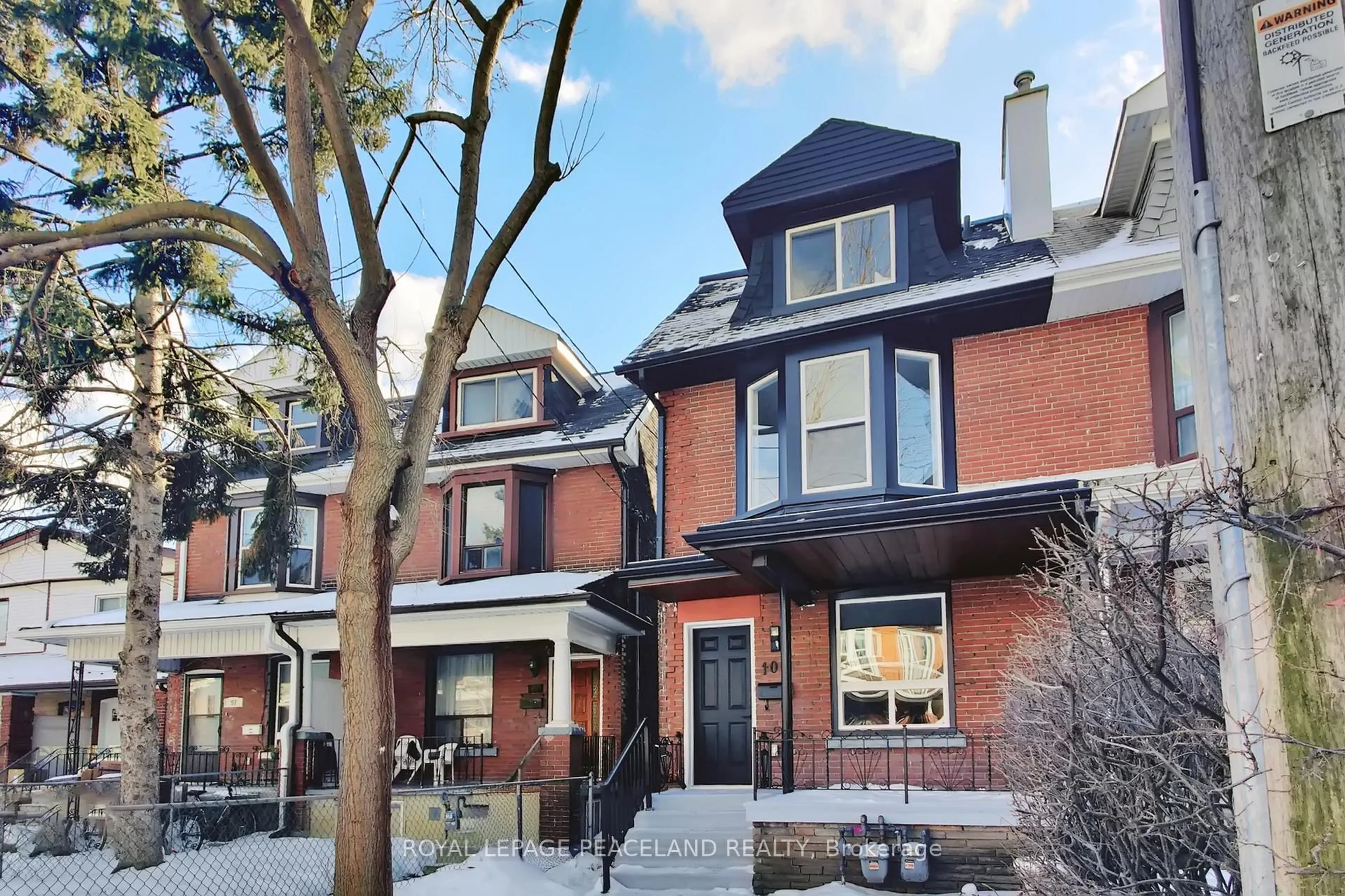Home with brick exterior material, street for 101 Marchmount Rd, Toronto Ontario M6G 2B2