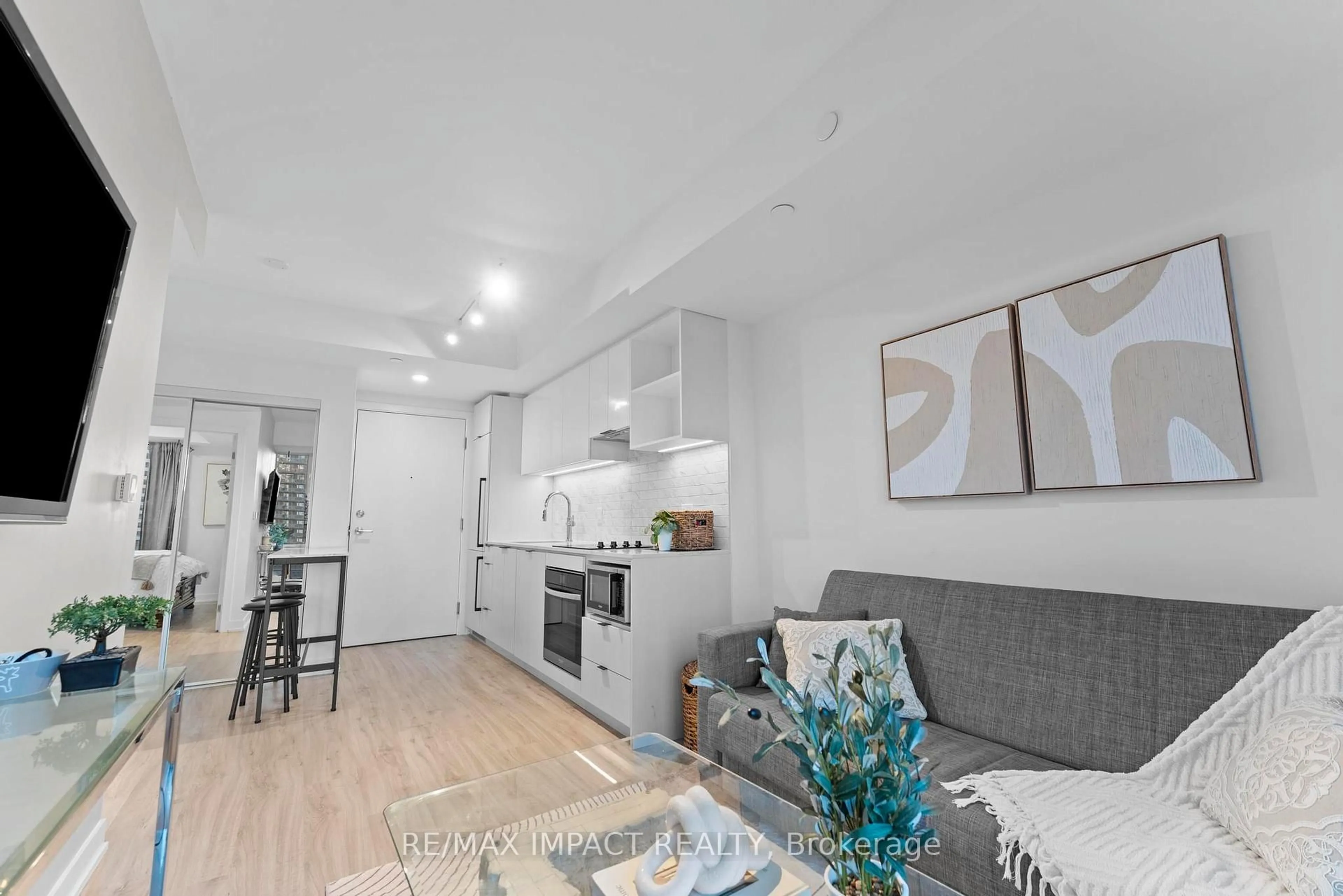 Open concept kitchen, wood/laminate floor for 252 Church St #2616, Toronto Ontario M5B 0E6