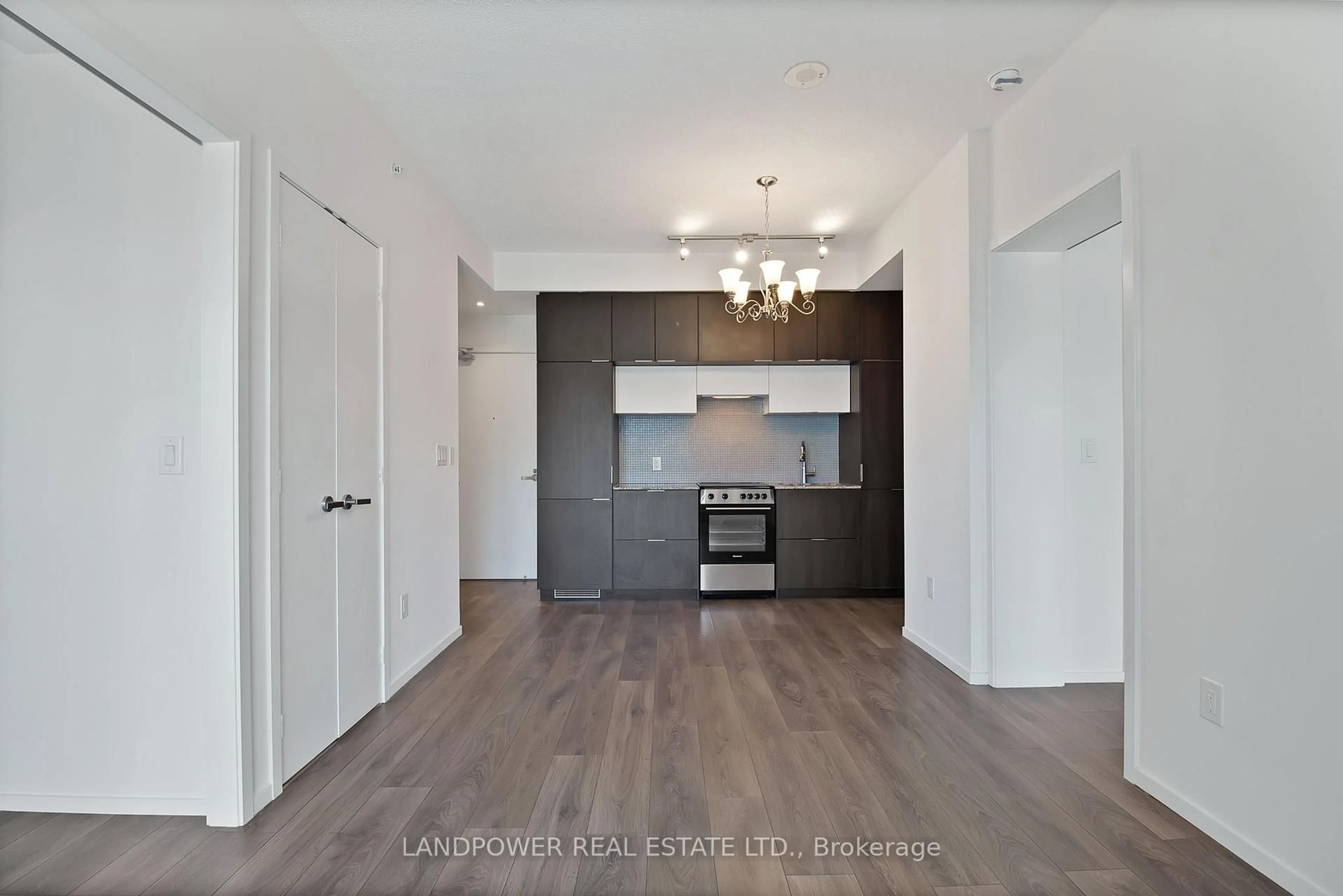 Open concept kitchen, wood/laminate floor for 159 Dundas St #1107, Toronto Ontario M5B 0A9
