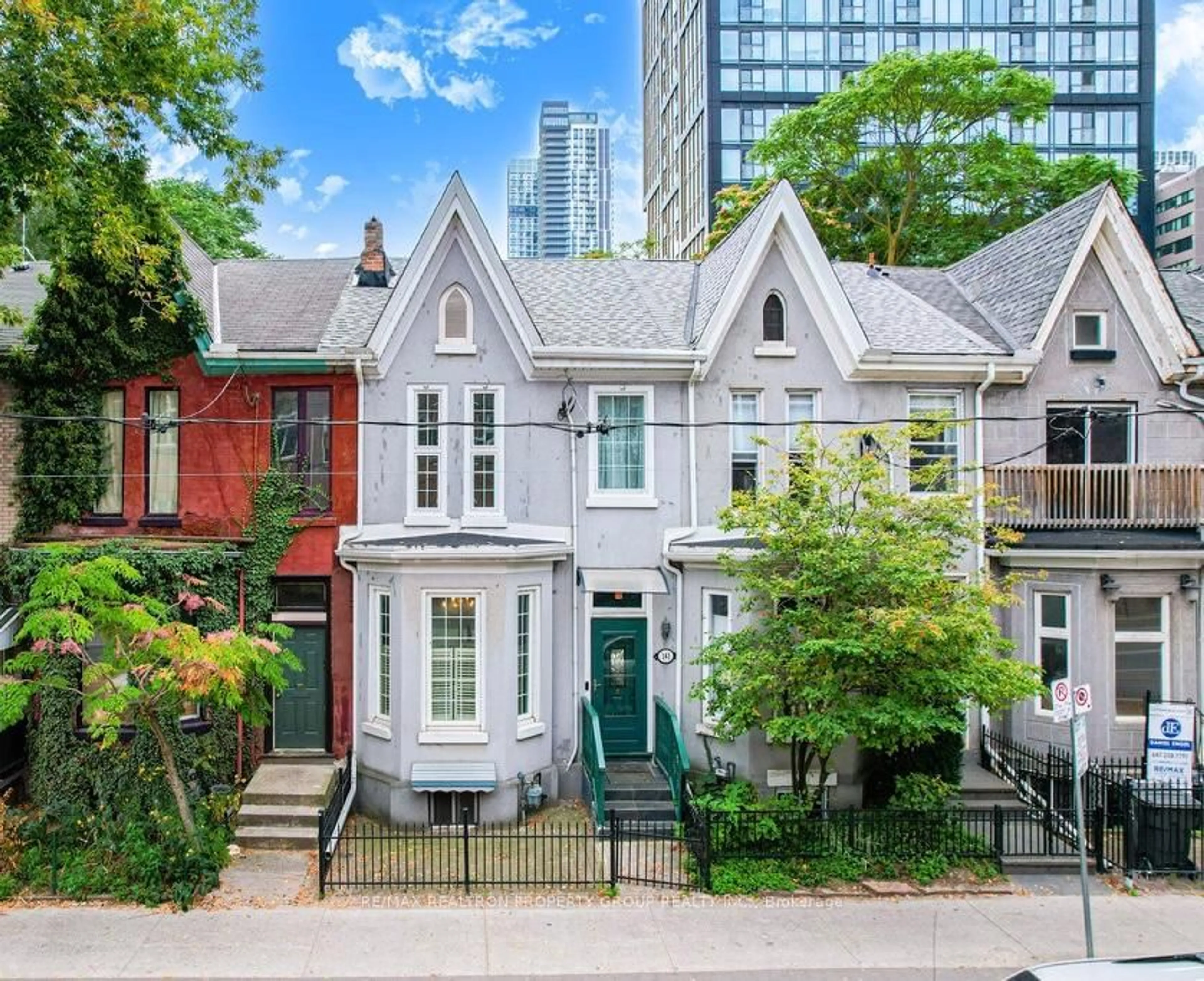 Home with brick exterior material, street for 141 Gerrard St, Toronto Ontario M5A 2E3