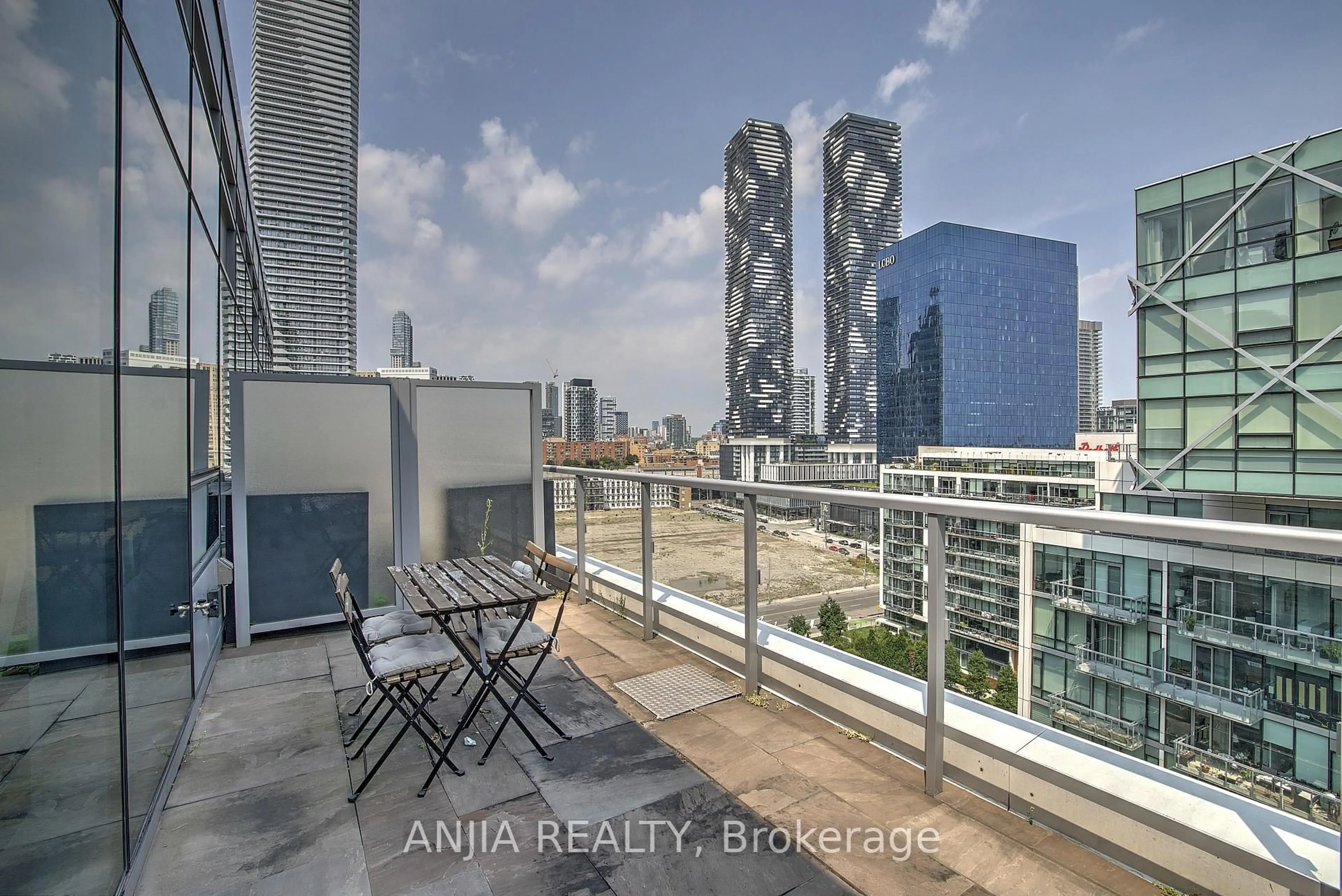Balcony in the apartment, city buildings view from balcony for 29 Queens Quay #ph1209, Toronto Ontario M5E 0A4