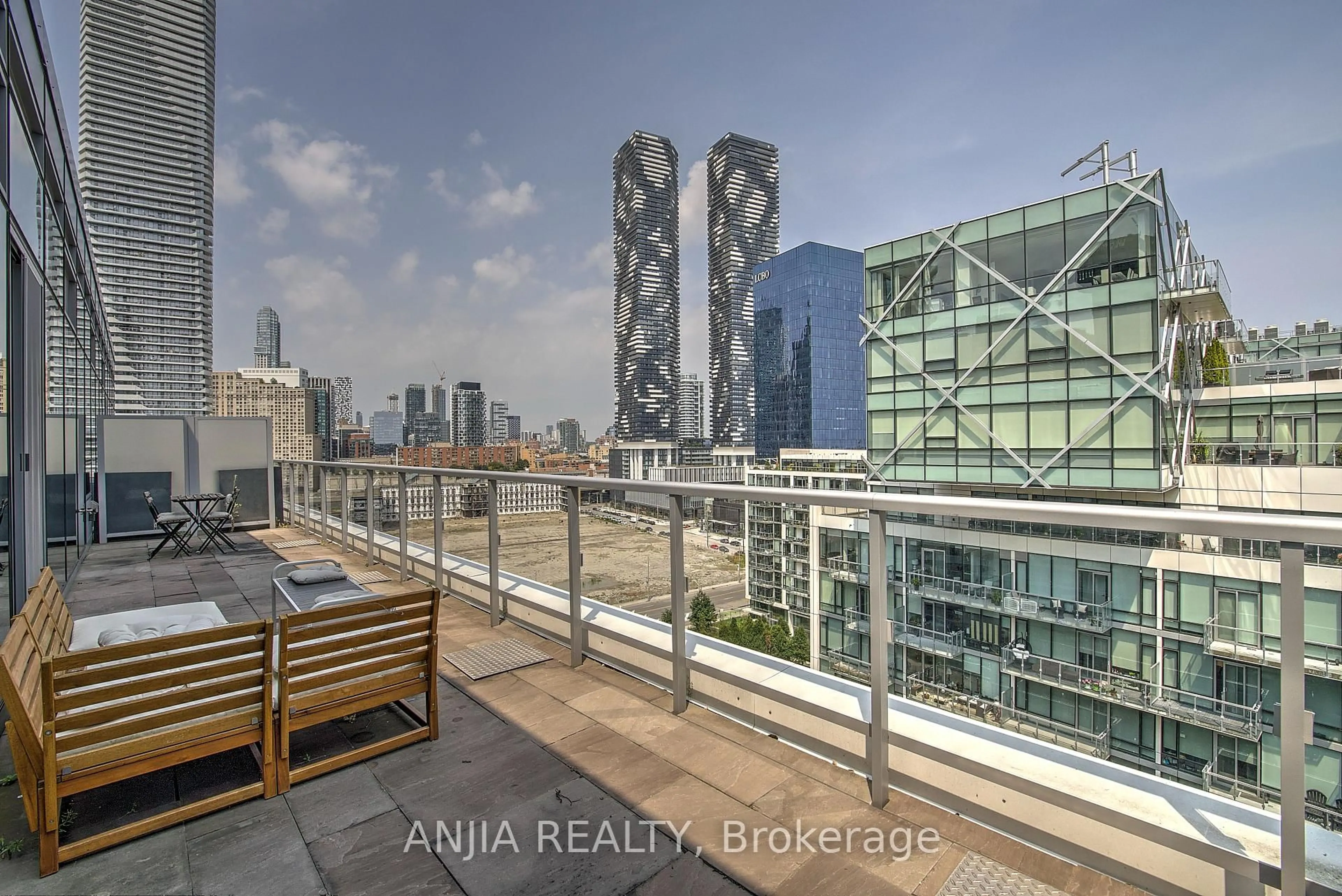 Balcony in the apartment, city buildings view from balcony for 29 Queens Quay #ph1209, Toronto Ontario M5E 0A4