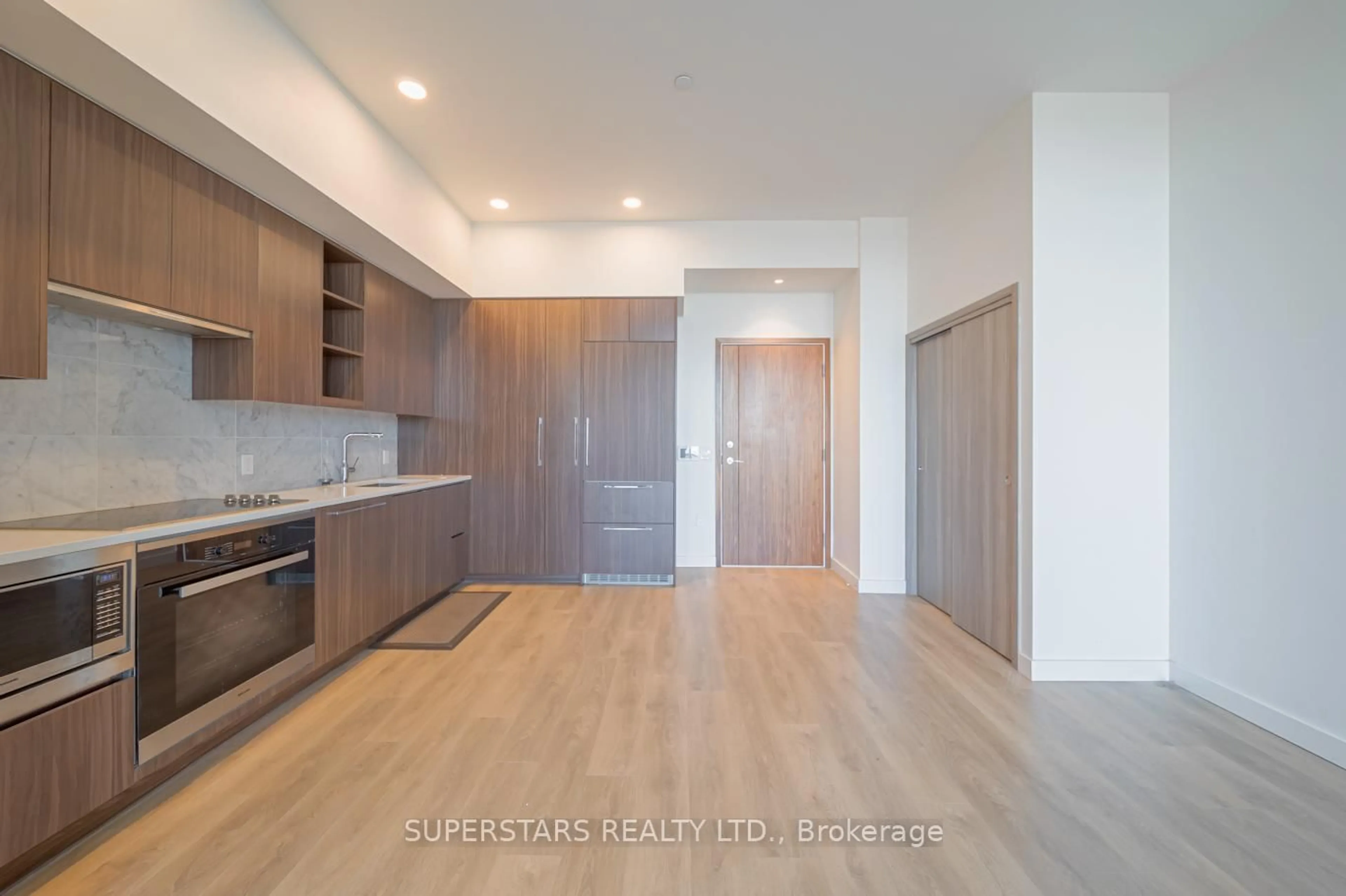 Open concept kitchen, wood/laminate floor for 95 McMahon Dr #4108, Toronto Ontario M2K 0H1