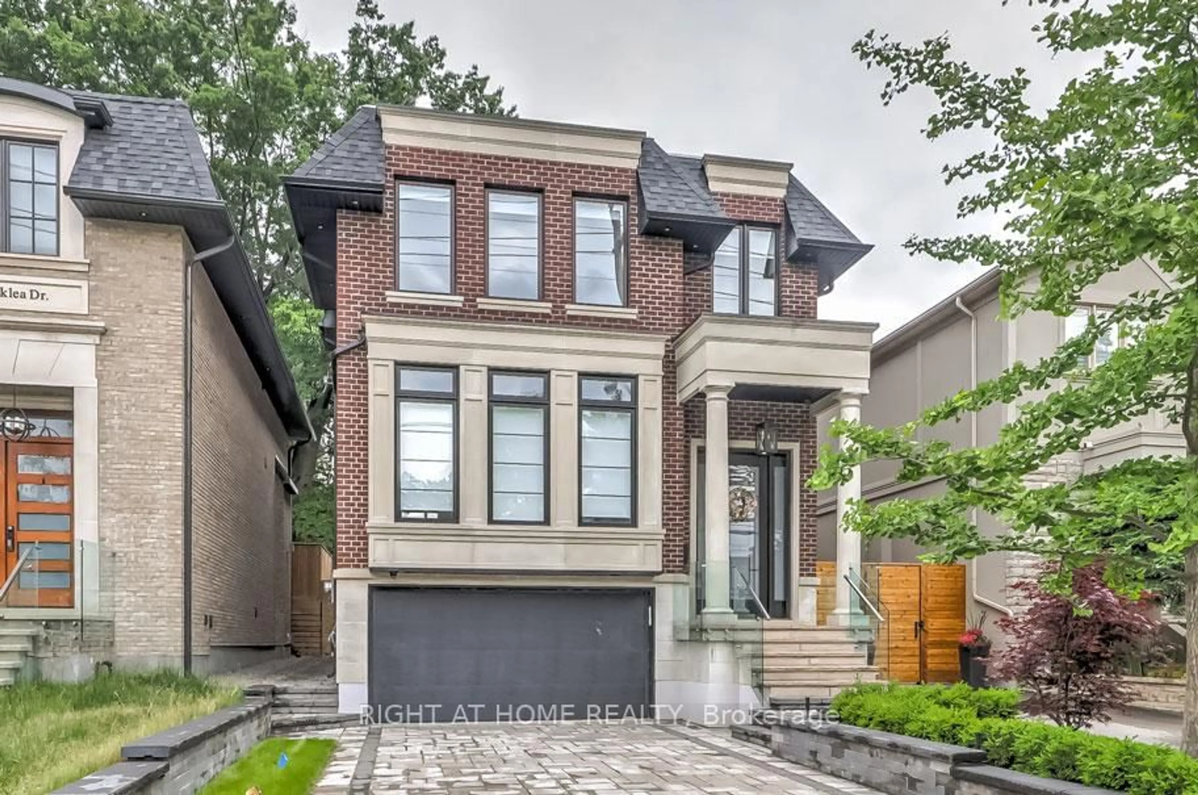 Home with brick exterior material, street for 102 Parklea Dr, Toronto Ontario M4G 2J8