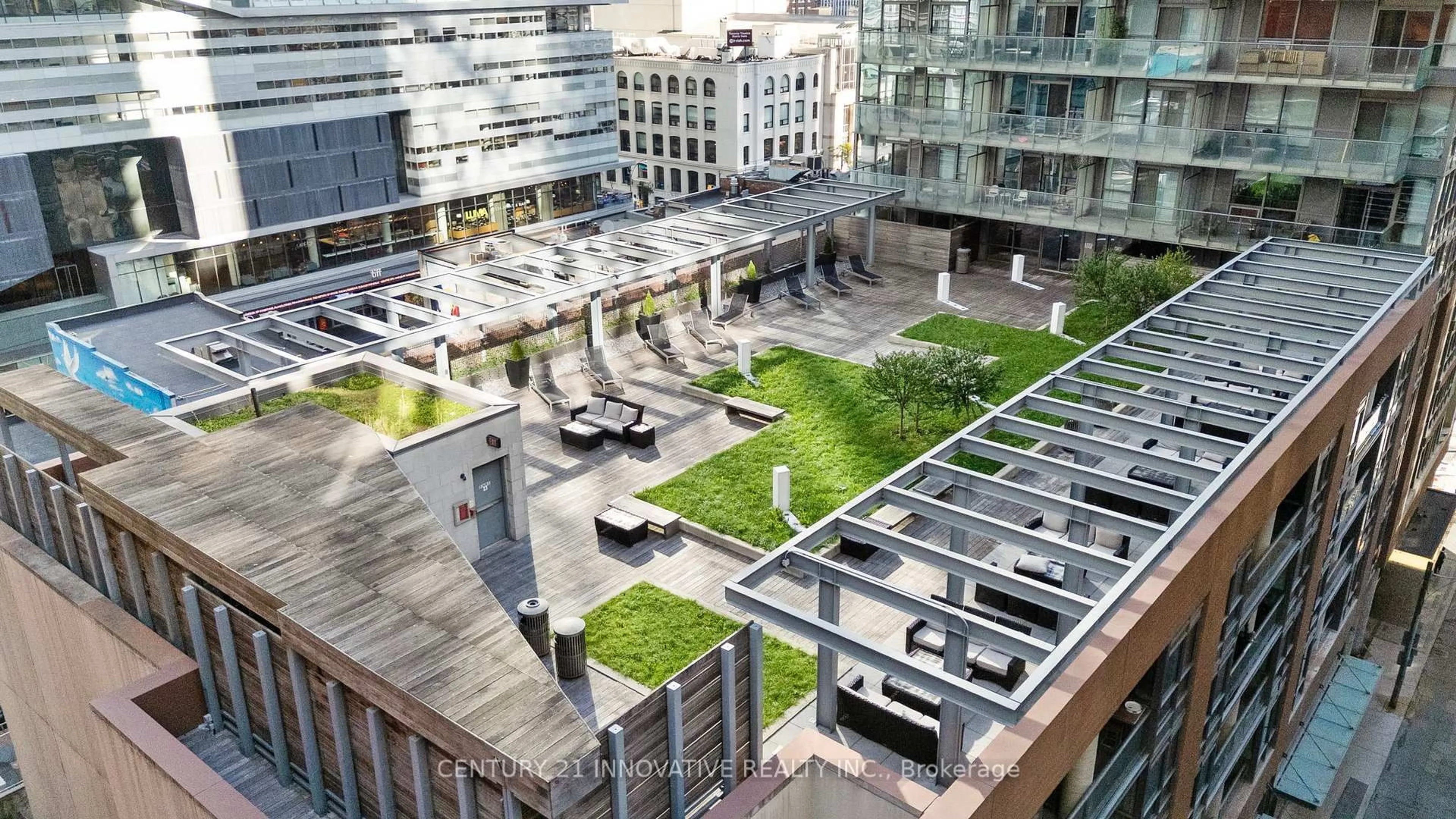 Patio, city buildings view from balcony for 8 Mercer St #507, Toronto Ontario M5V 0C4