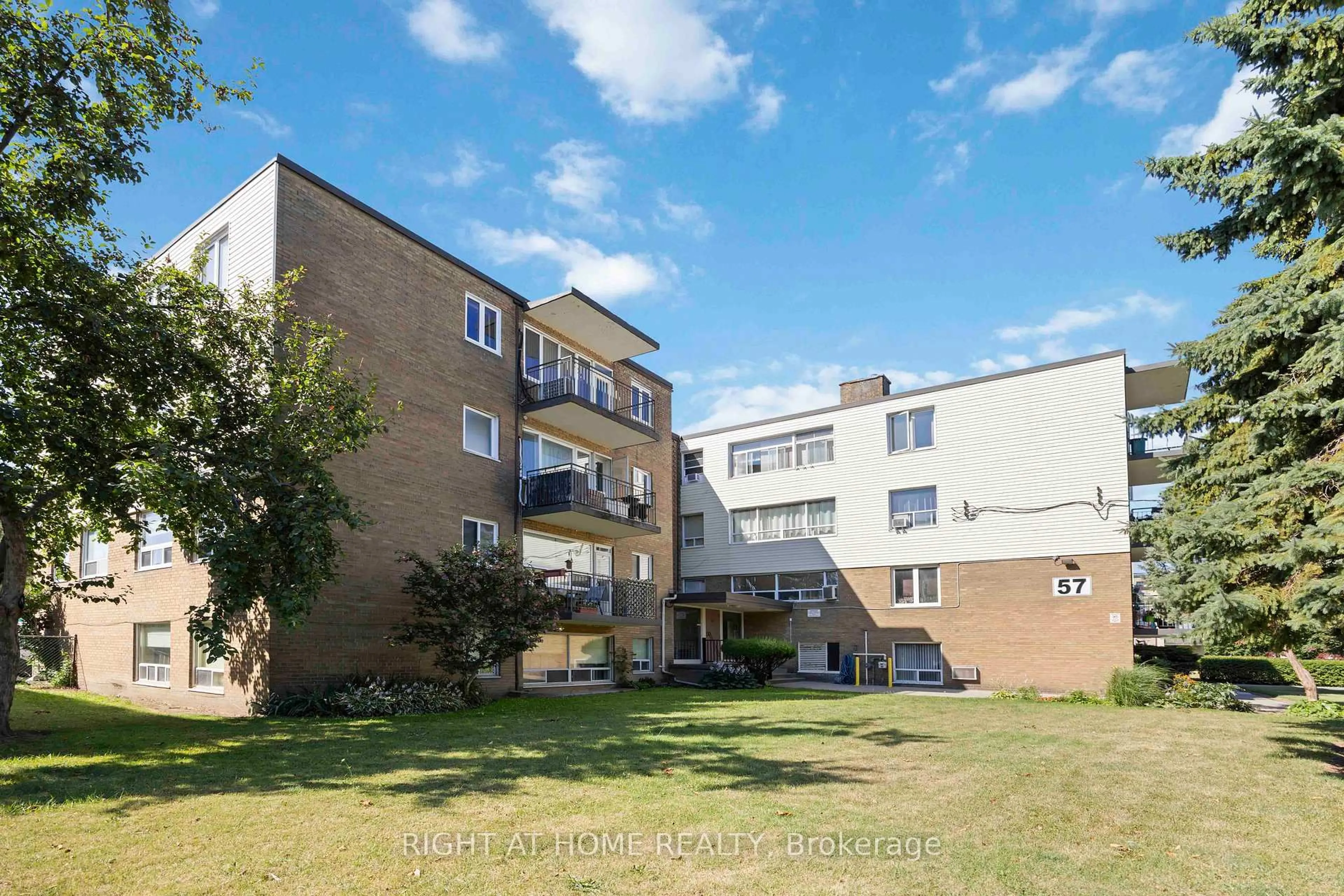 A pic from outside/outdoor area/front of a property/back of a property/a pic from drone, building for 57 Neptune Dr #103, Toronto Ontario M6A 1X2