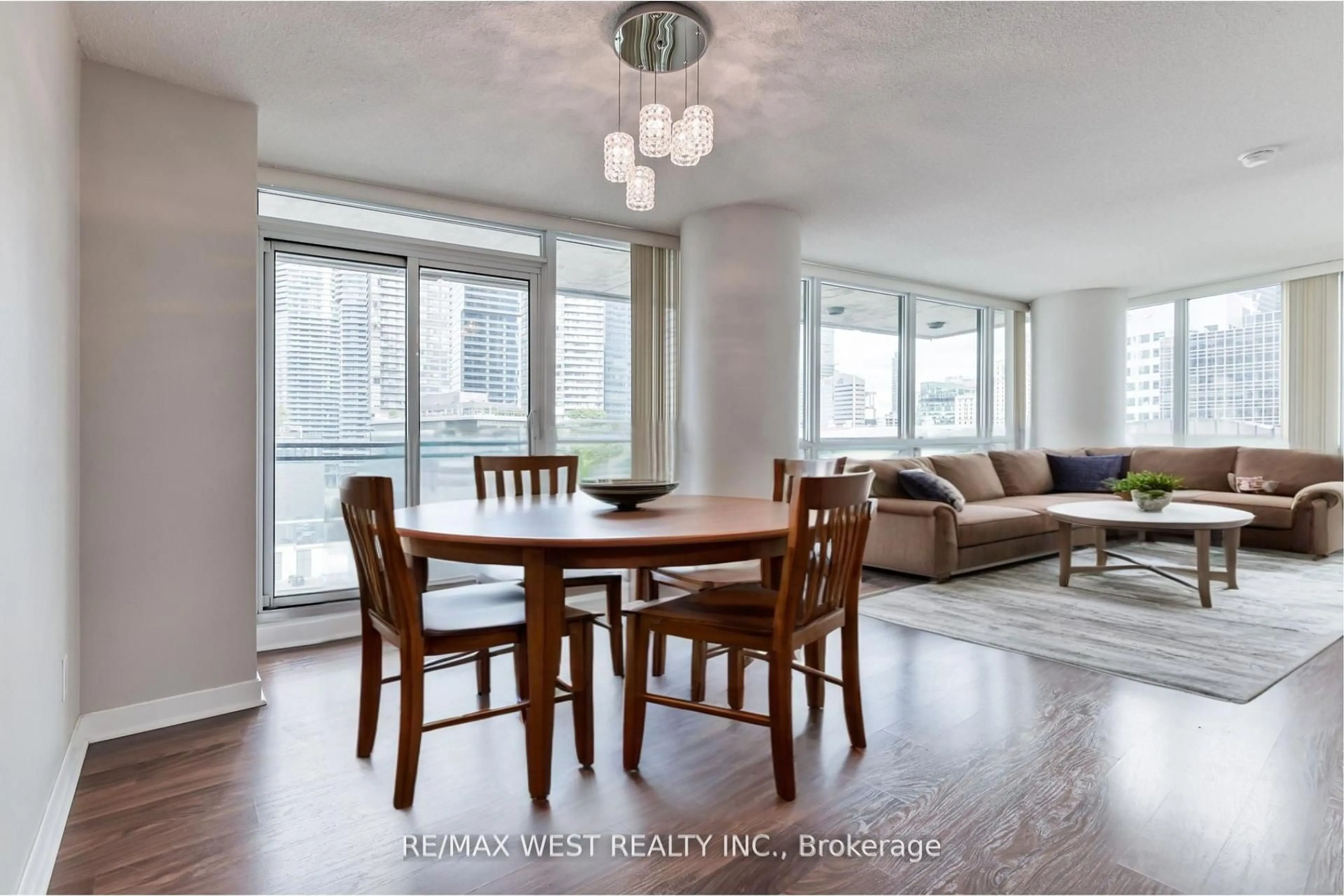 Living room with furniture, wood/laminate floor for 33 Bay St #903, Toronto Ontario M5J 2Z3