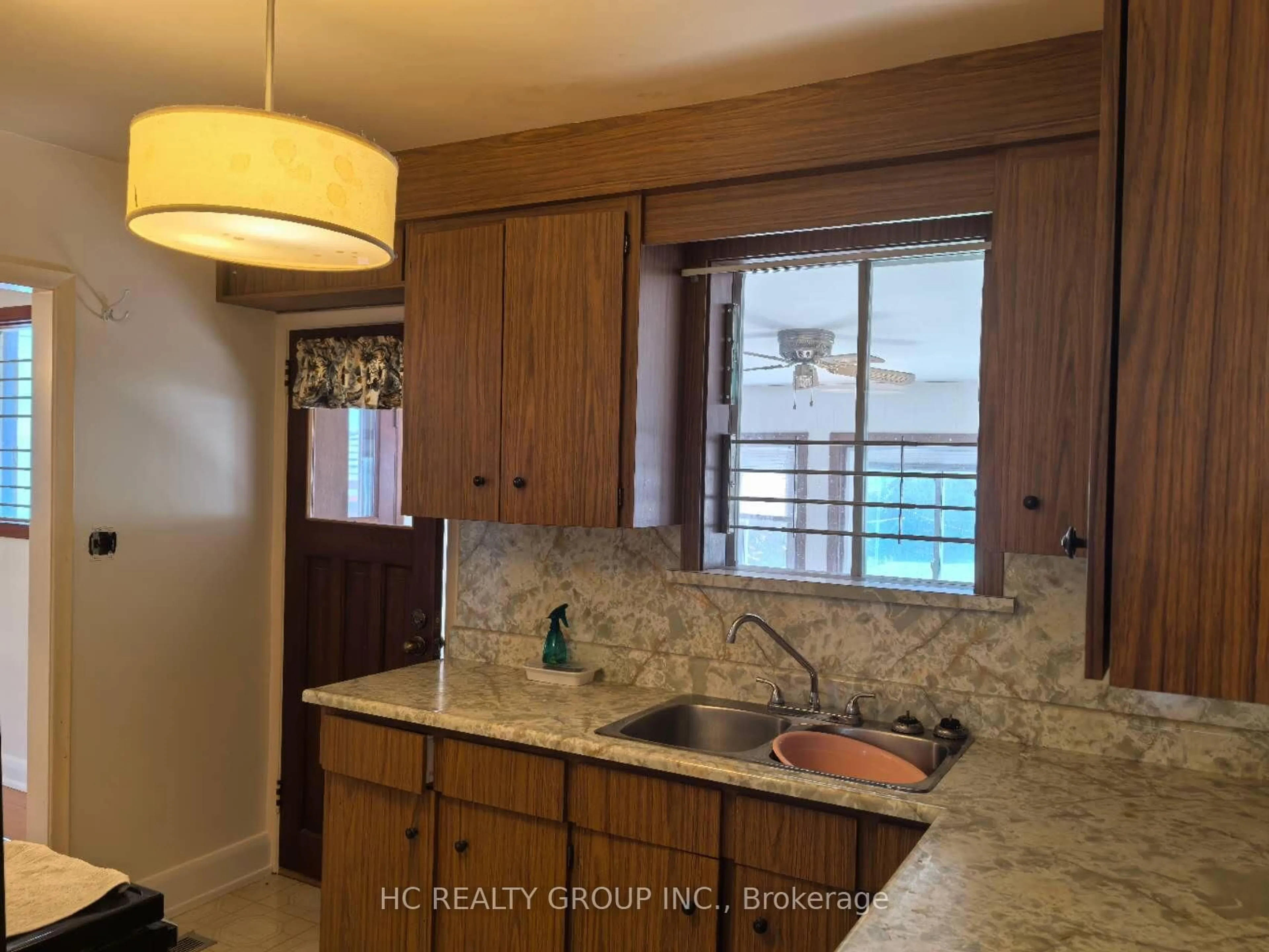 Kitchen with laundary machines, ceramic/tile floor for 21 Norcross Rd, Toronto Ontario M3H 2R3