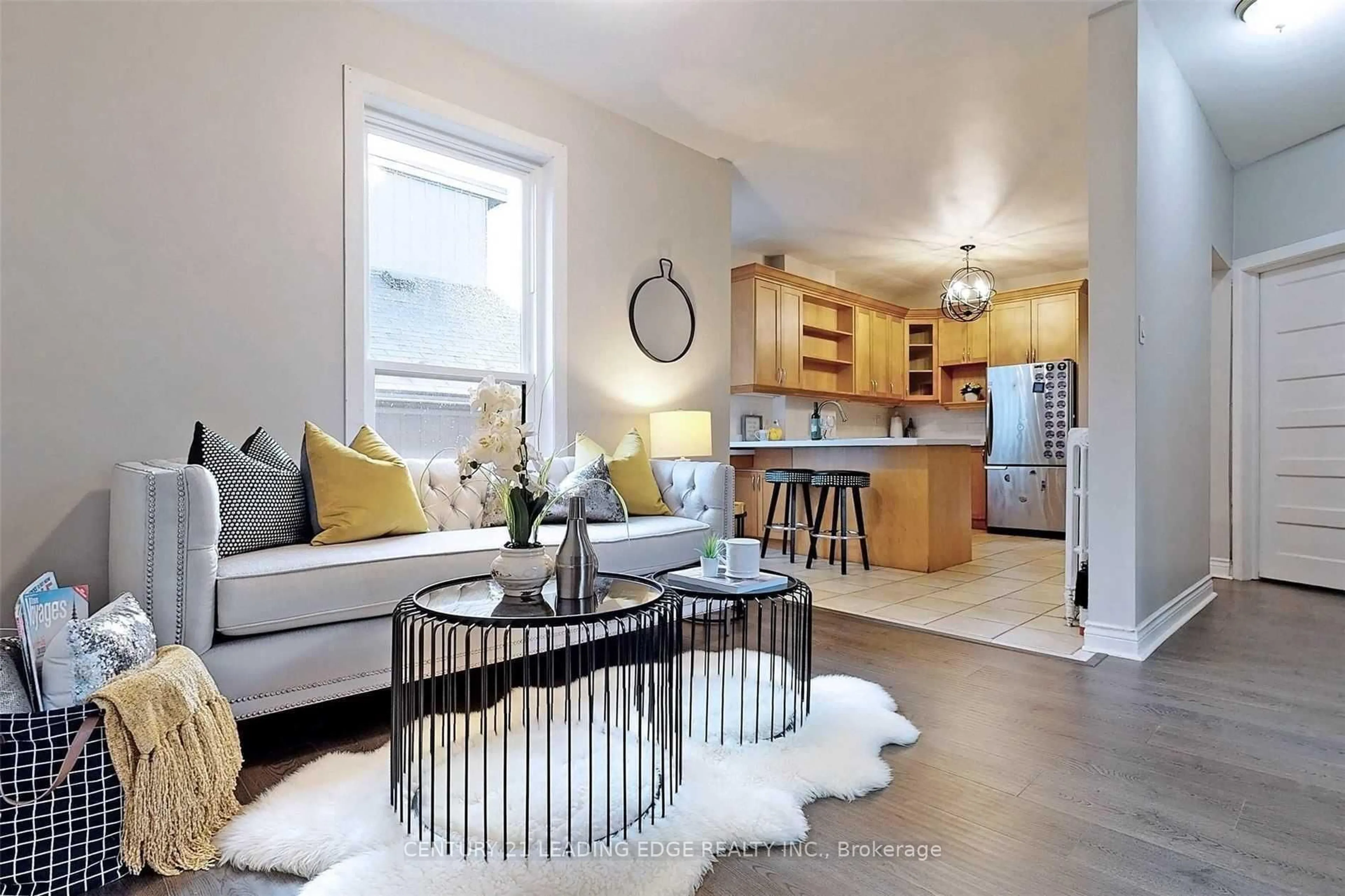 Living room with furniture, wood/laminate floor for 233 BORDEN St, Toronto Ontario M5S 2N5