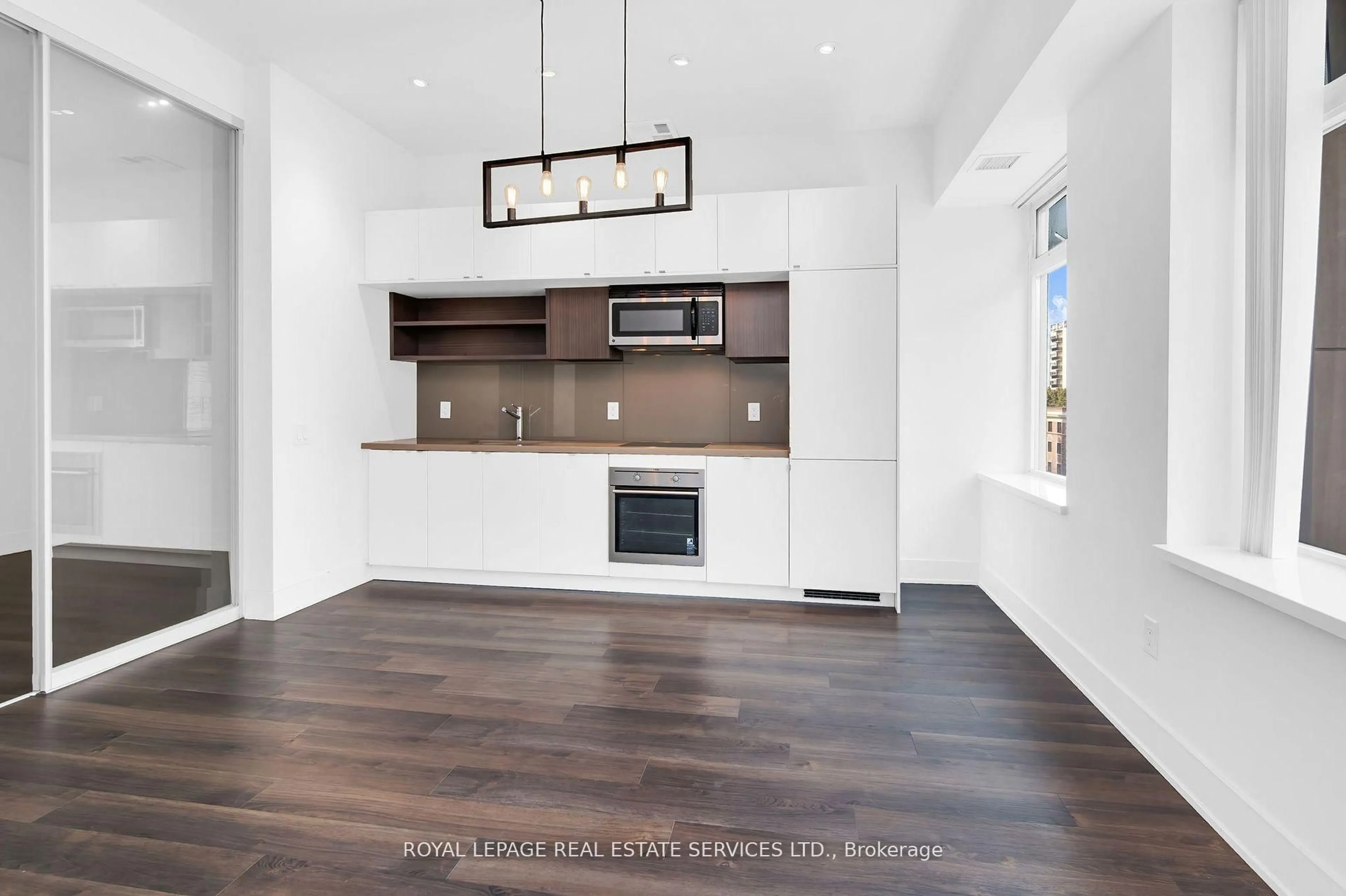 Open concept kitchen, unknown for 111 St Clair Ave #402, Toronto Ontario M4V 1N5