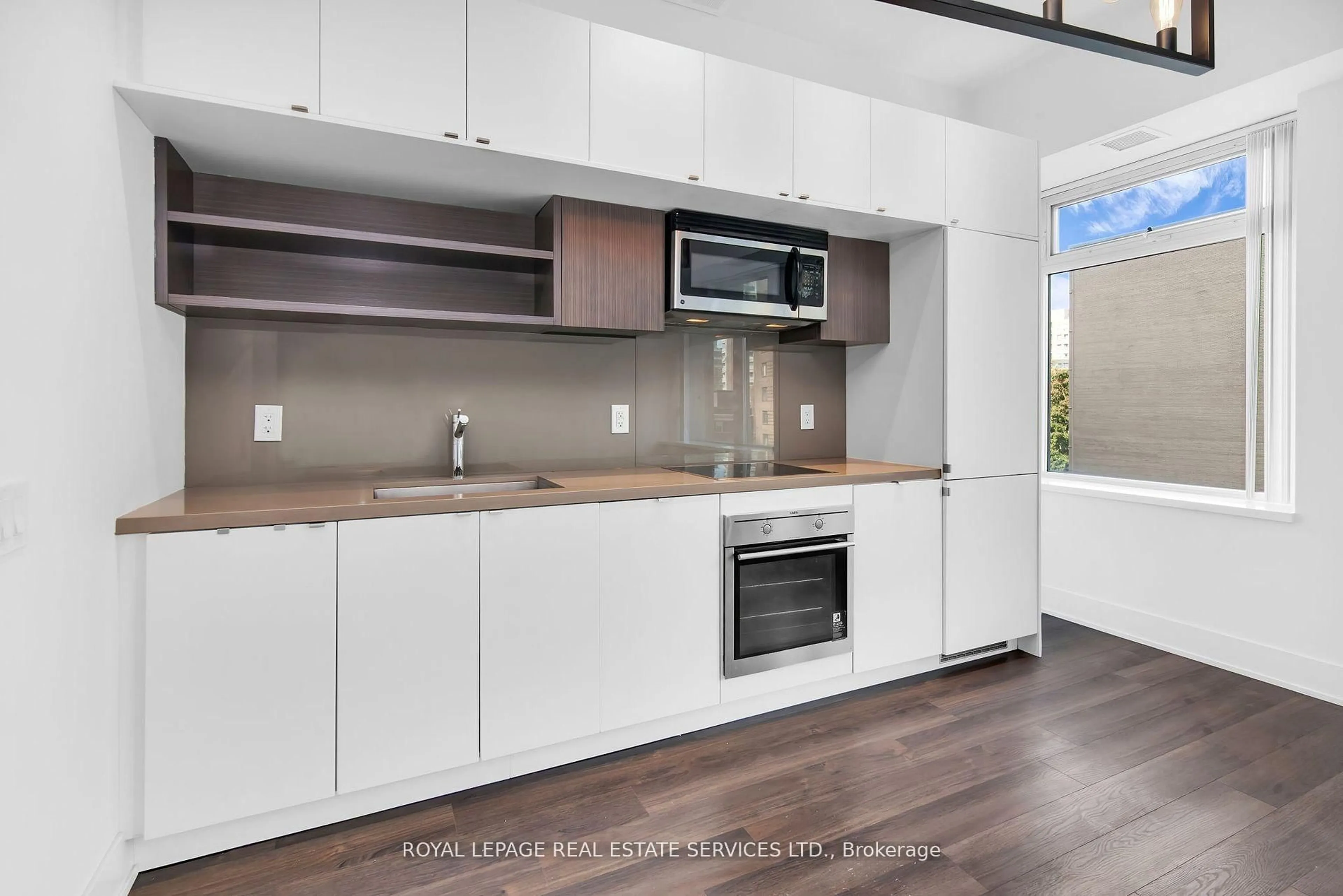 Open concept kitchen, unknown for 111 St Clair Ave #402, Toronto Ontario M4V 1N5