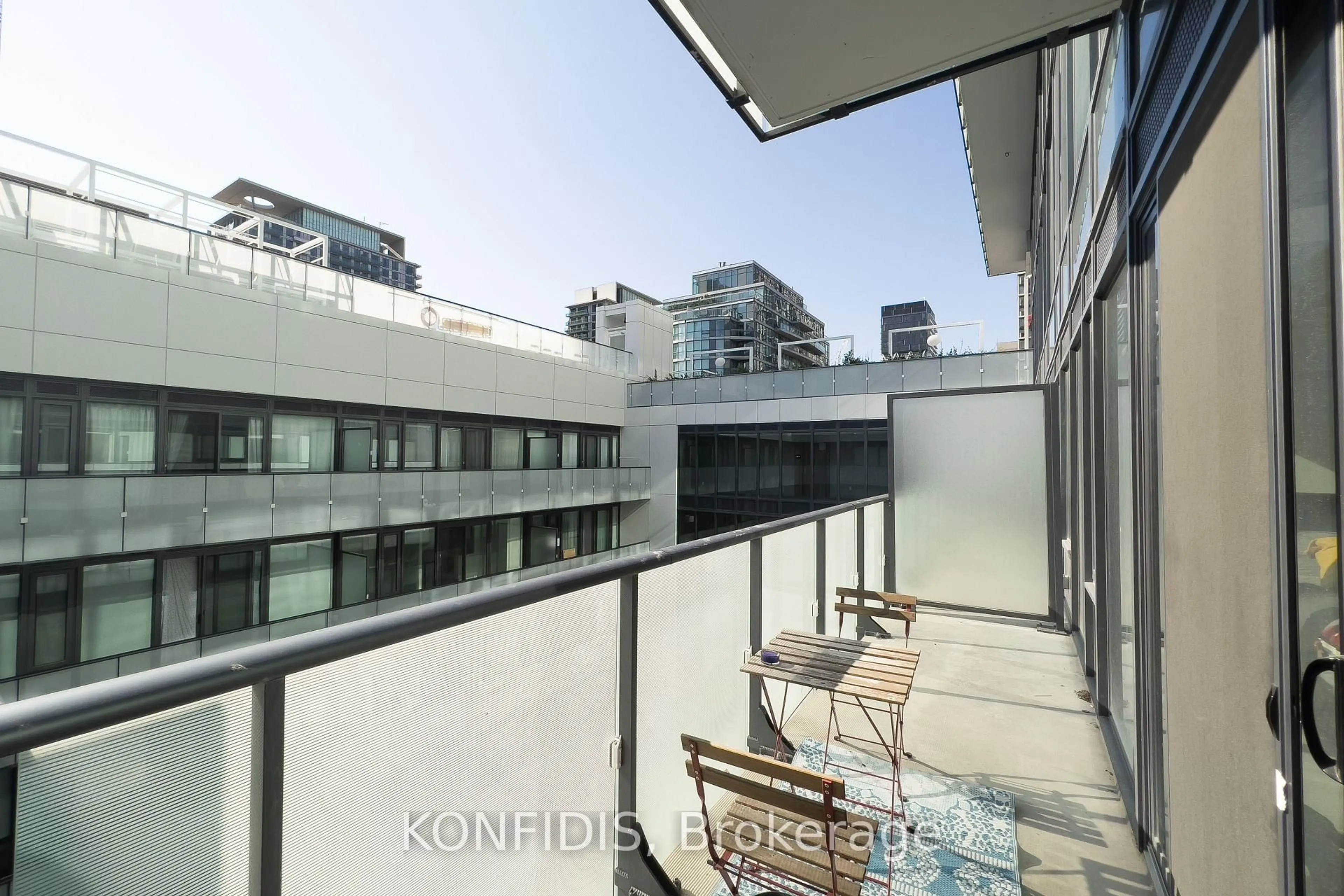 Balcony in the apartment, city buildings view from balcony for 161 Roehampton Ave #732, Toronto Ontario M4P 0C8