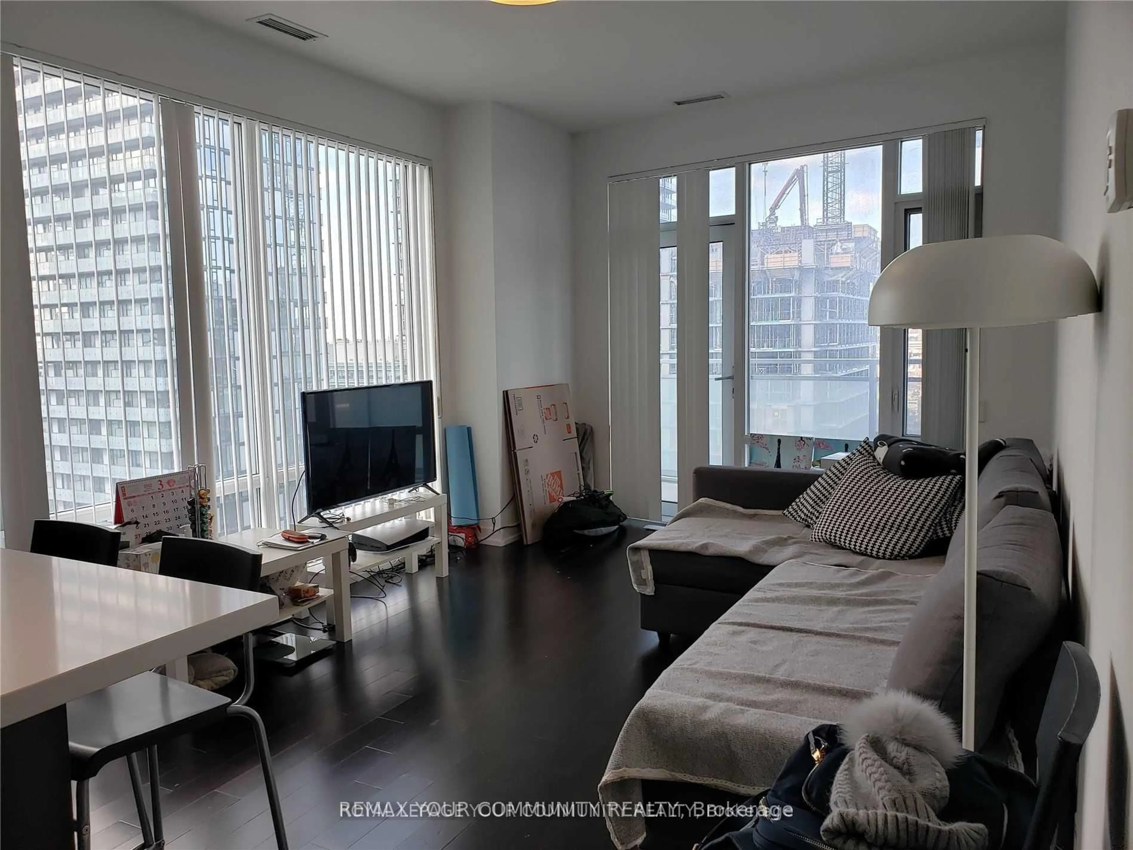 Living room with furniture, wood/laminate floor for 21 Widmer St #2302, Toronto Ontario M5V 0B8