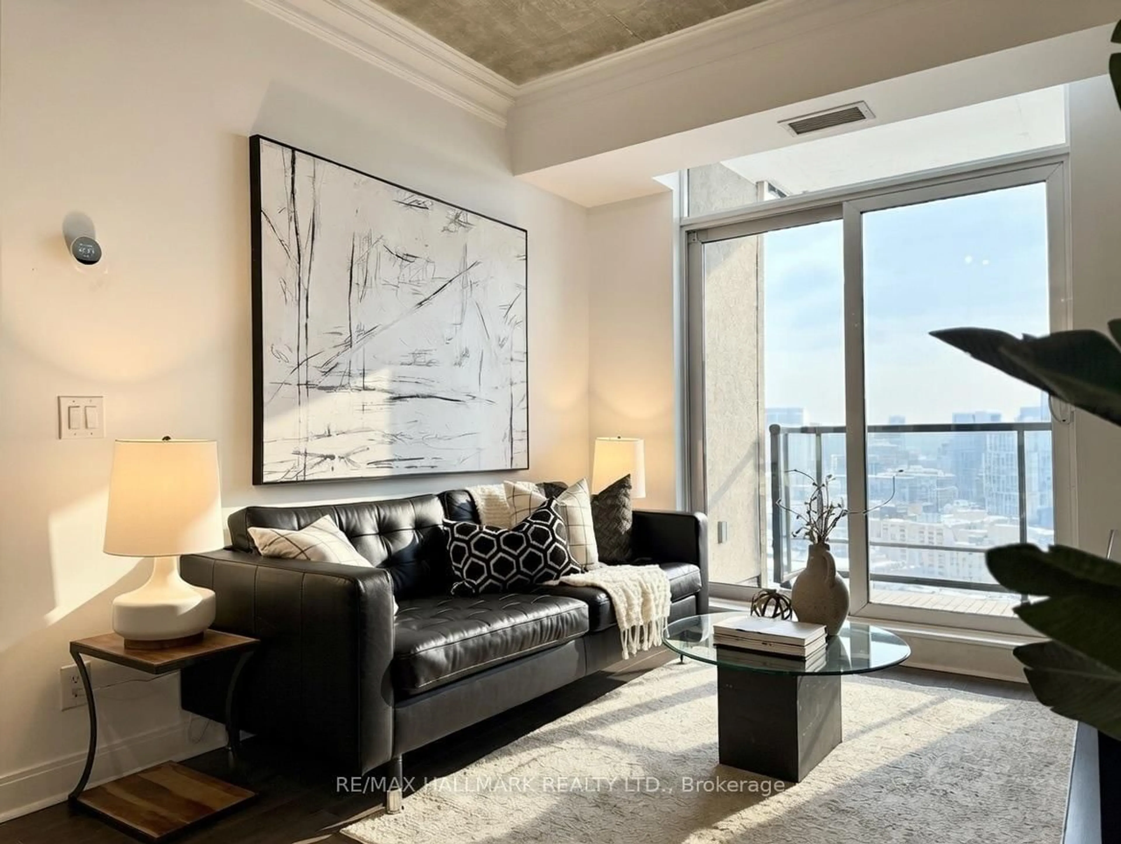 Living room with furniture, unknown for 1 Scott St #3001, Toronto Ontario M5E 1A1