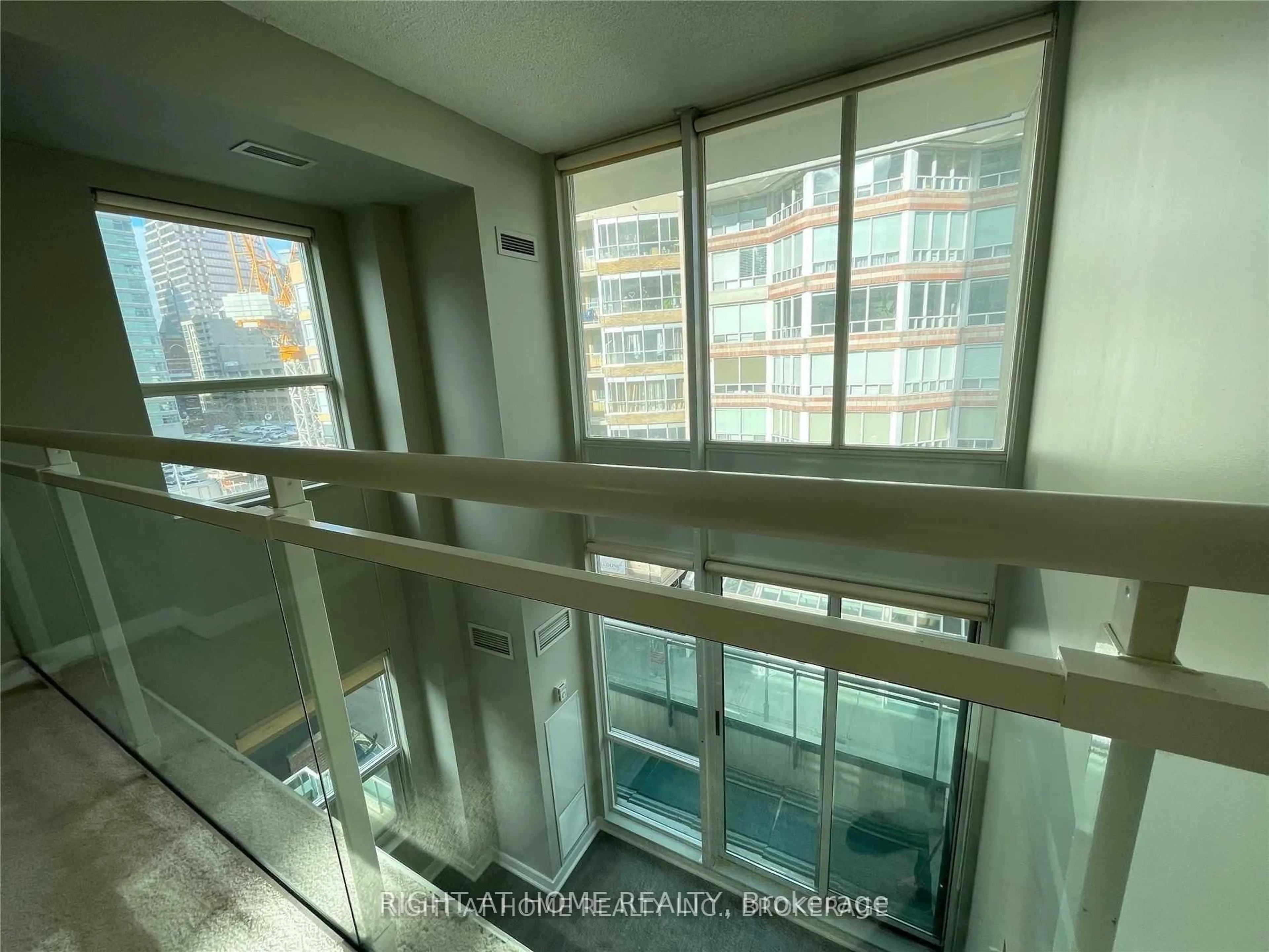 Balcony in the apartment, city buildings view from balcony for 77 Lombard St #501, Toronto Ontario M5C 3E1