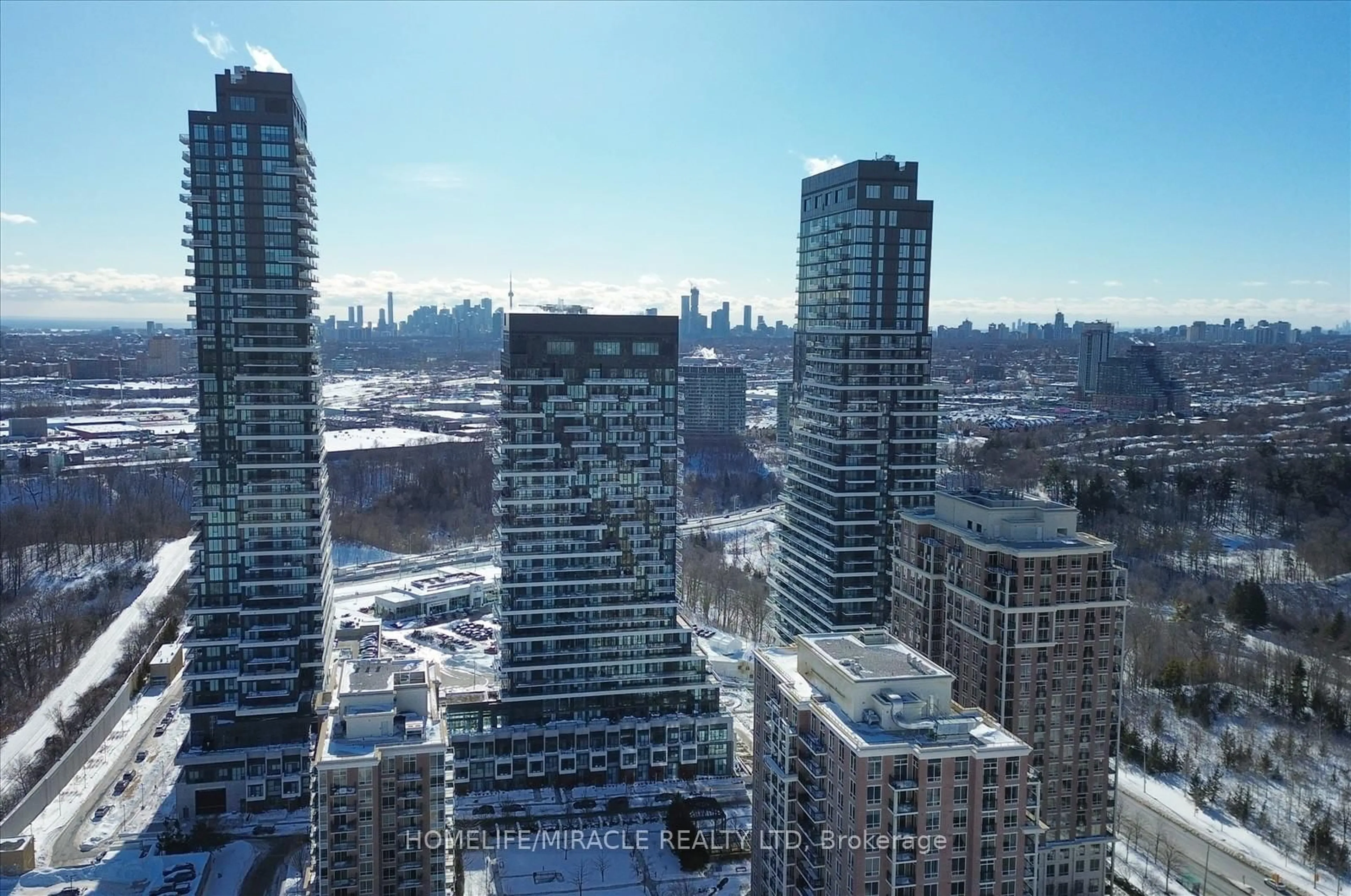 A pic from outside/outdoor area/front of a property/back of a property/a pic from drone, city buildings view from balcony for 30 Inn On The Park Dr #512, Toronto Ontario M3C 0P7