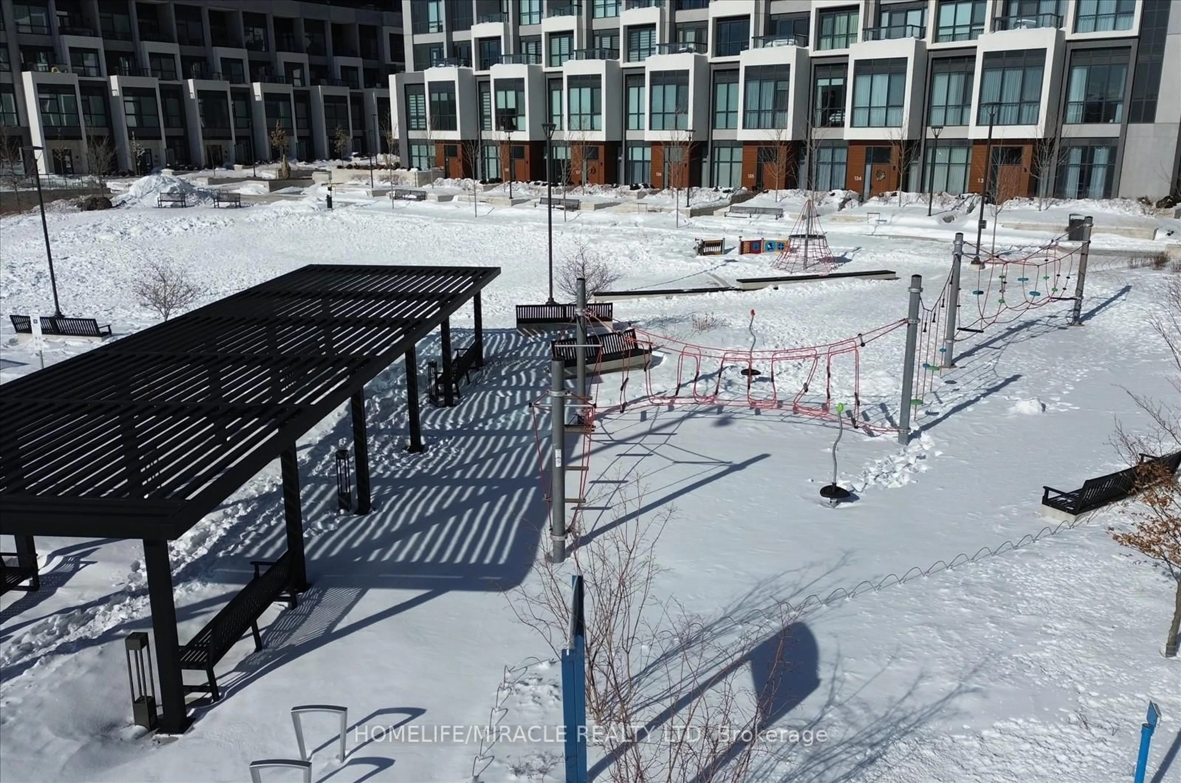 A pic from outside/outdoor area/front of a property/back of a property/a pic from drone, city buildings view from balcony for 30 Inn On The Park Dr #512, Toronto Ontario M3C 0P7