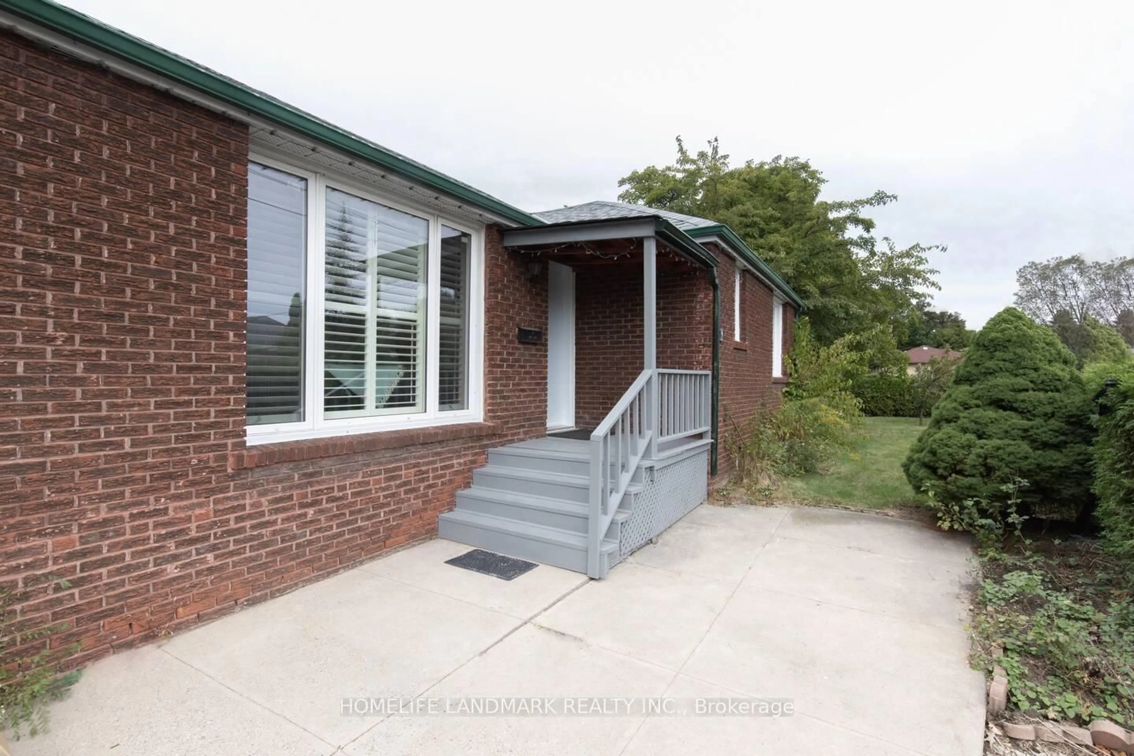 Home with brick exterior material, street for 2 Collinson Blvd, Toronto Ontario M3H 3B8