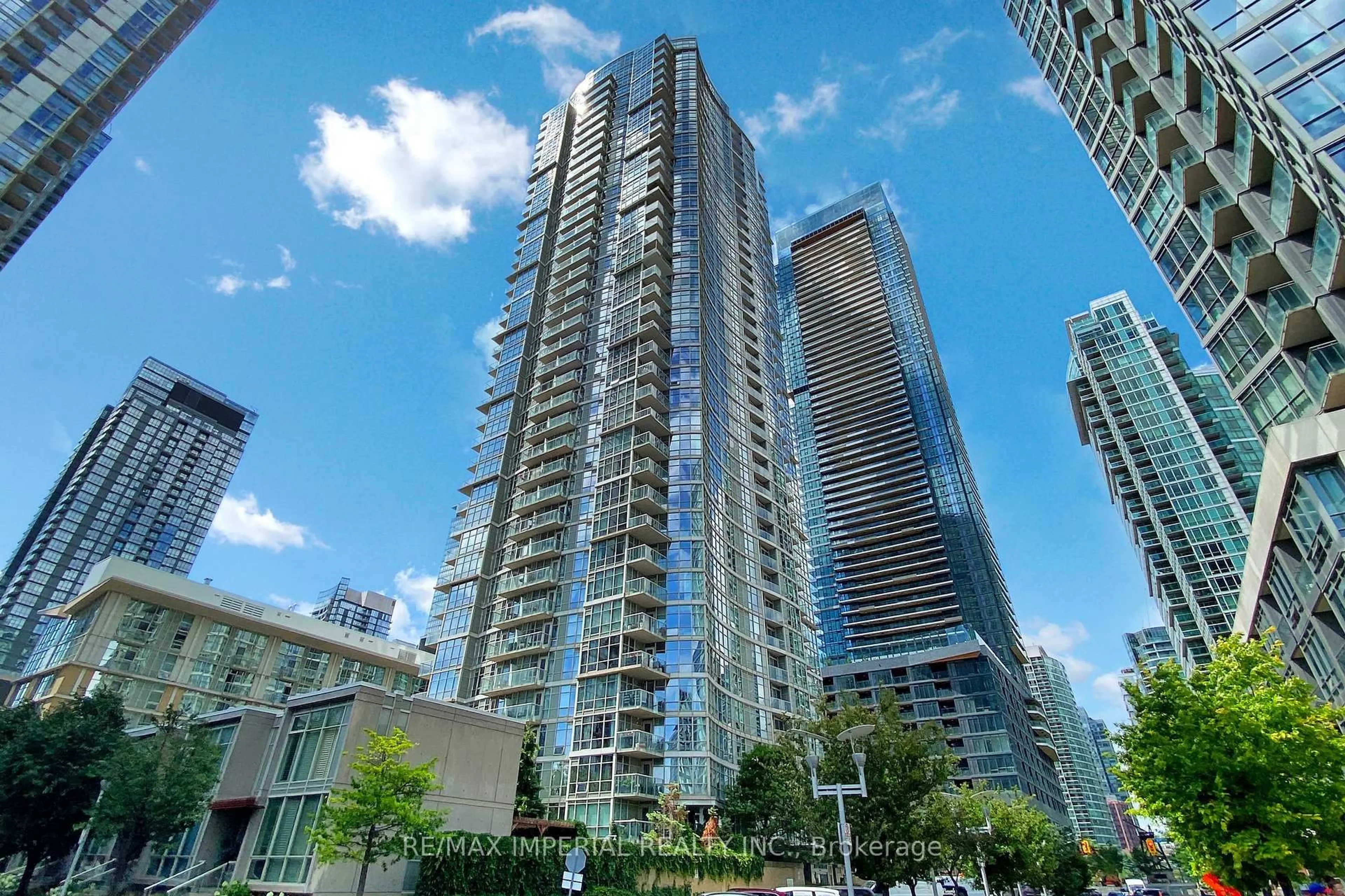 Patio, city buildings view from balcony for 10 Navy Wharf Crt #1909, Toronto Ontario M5V 3V2