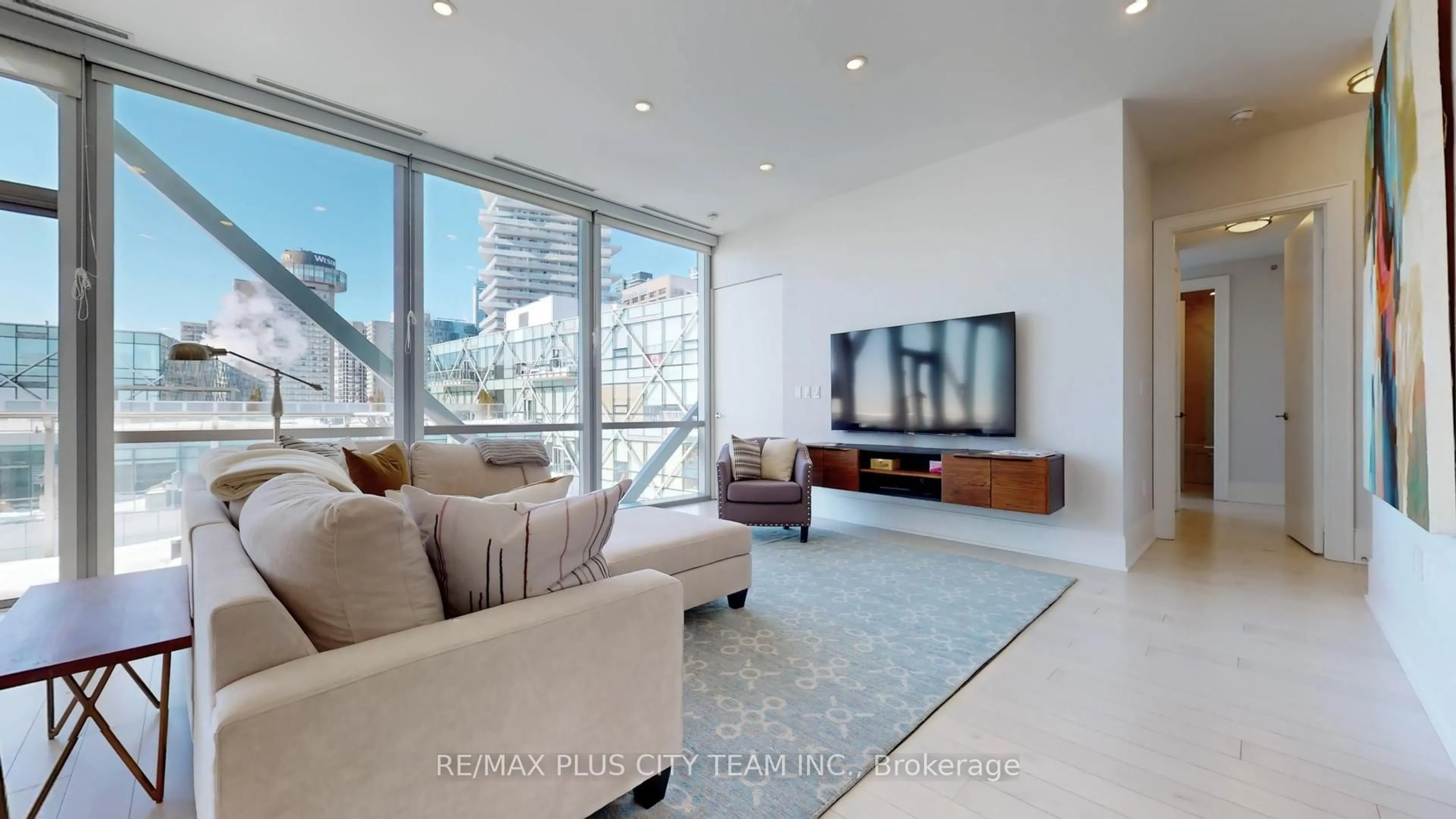 Living room with furniture, unknown for 39 Queens Quay #1305, Toronto Ontario M5E 0A5