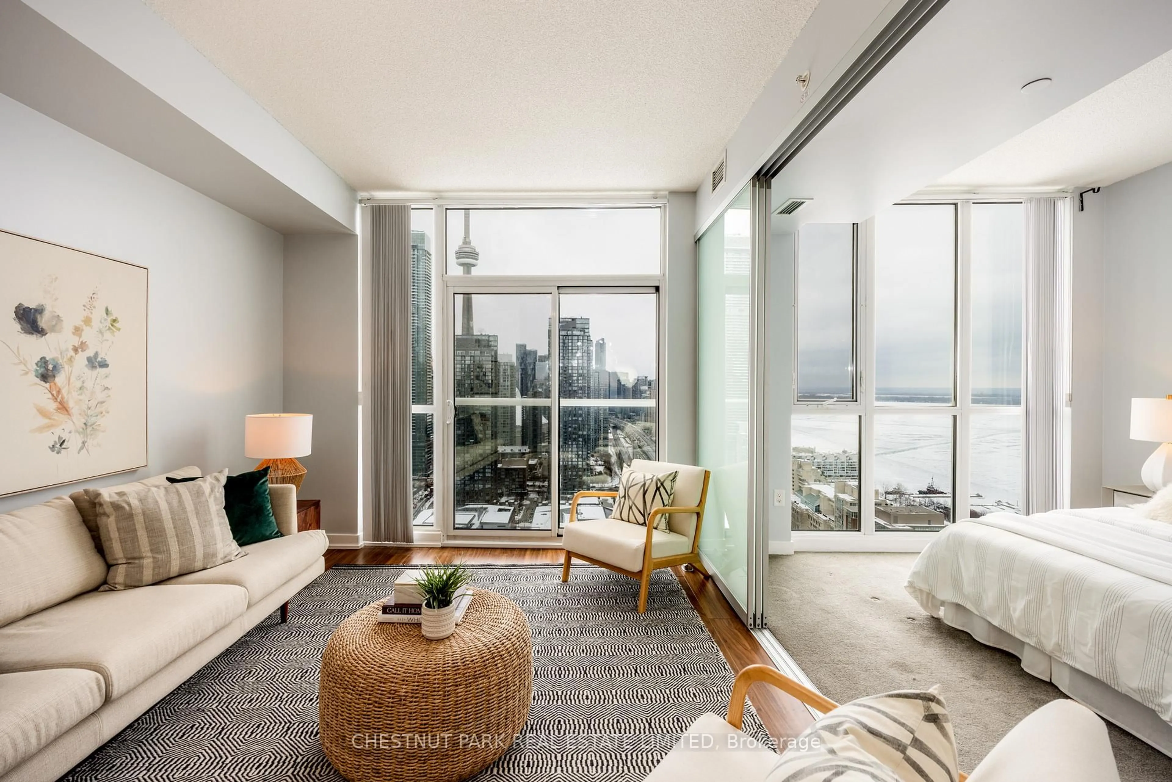 Living room with furniture, cement floor for 75 Queens Wharf Rd #3903, Toronto Ontario M5V 0J8