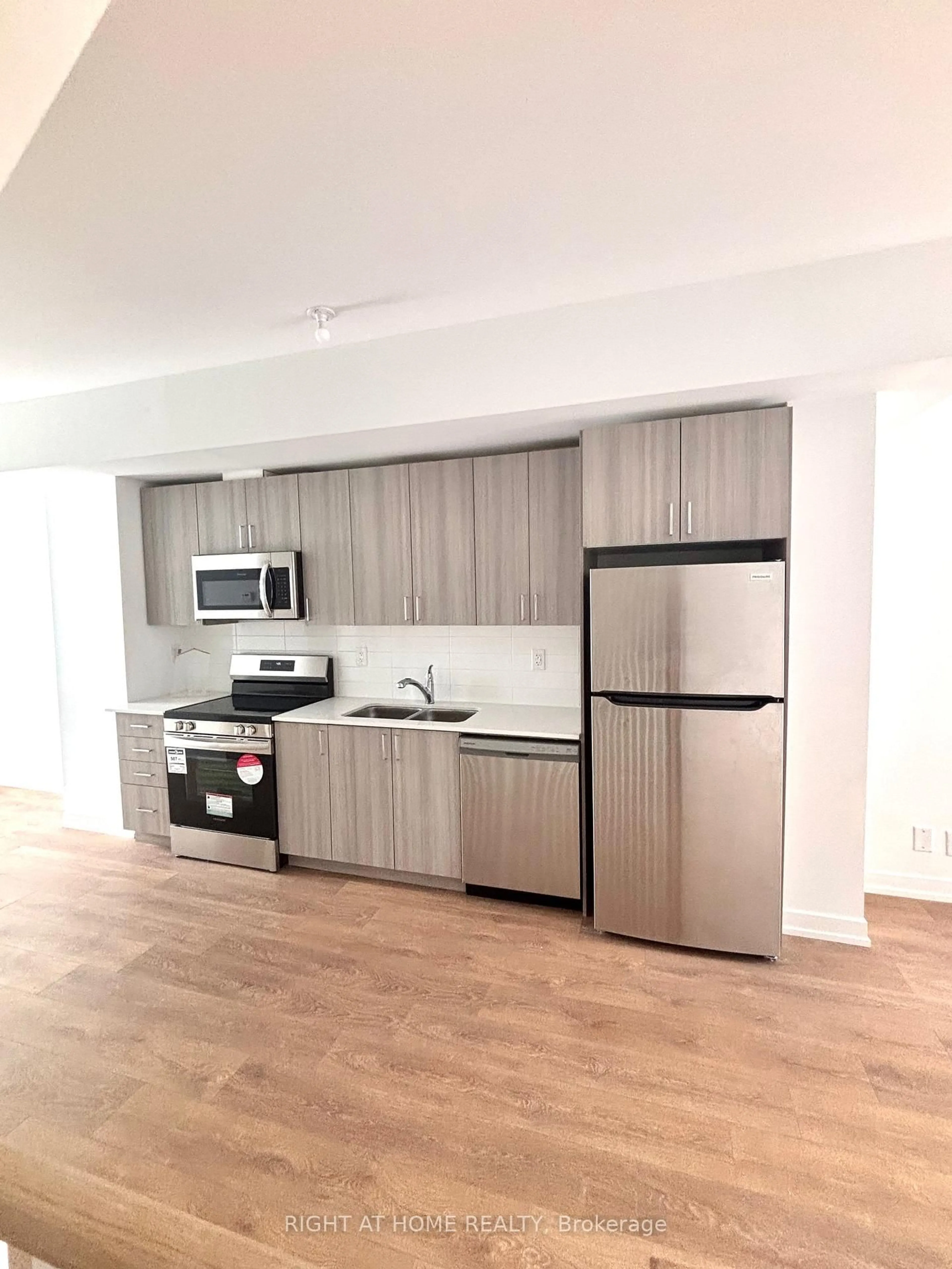 Standard kitchen, wood/laminate floor for 23 Case Ootes Dr, Toronto Ontario M4A 0A9