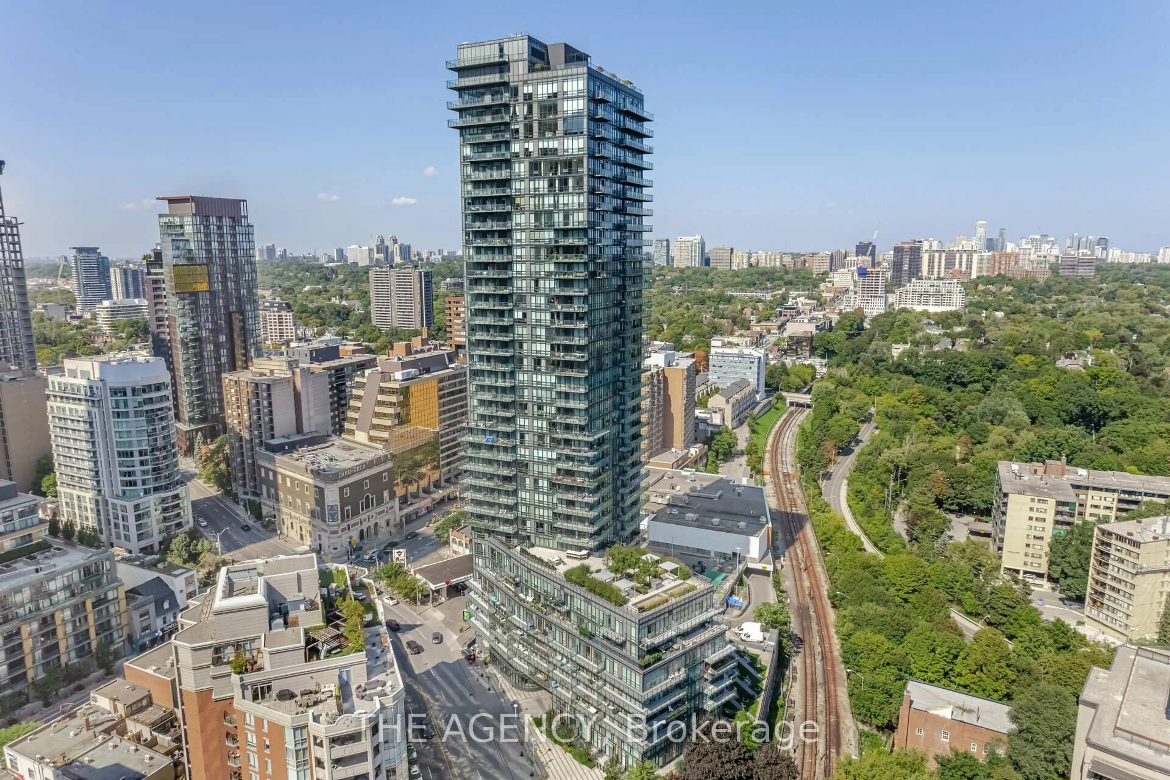 A pic from outside/outdoor area/front of a property/back of a property/a pic from drone, city buildings view from balcony for 825 Church St #105, Toronto Ontario M4W 3Z4