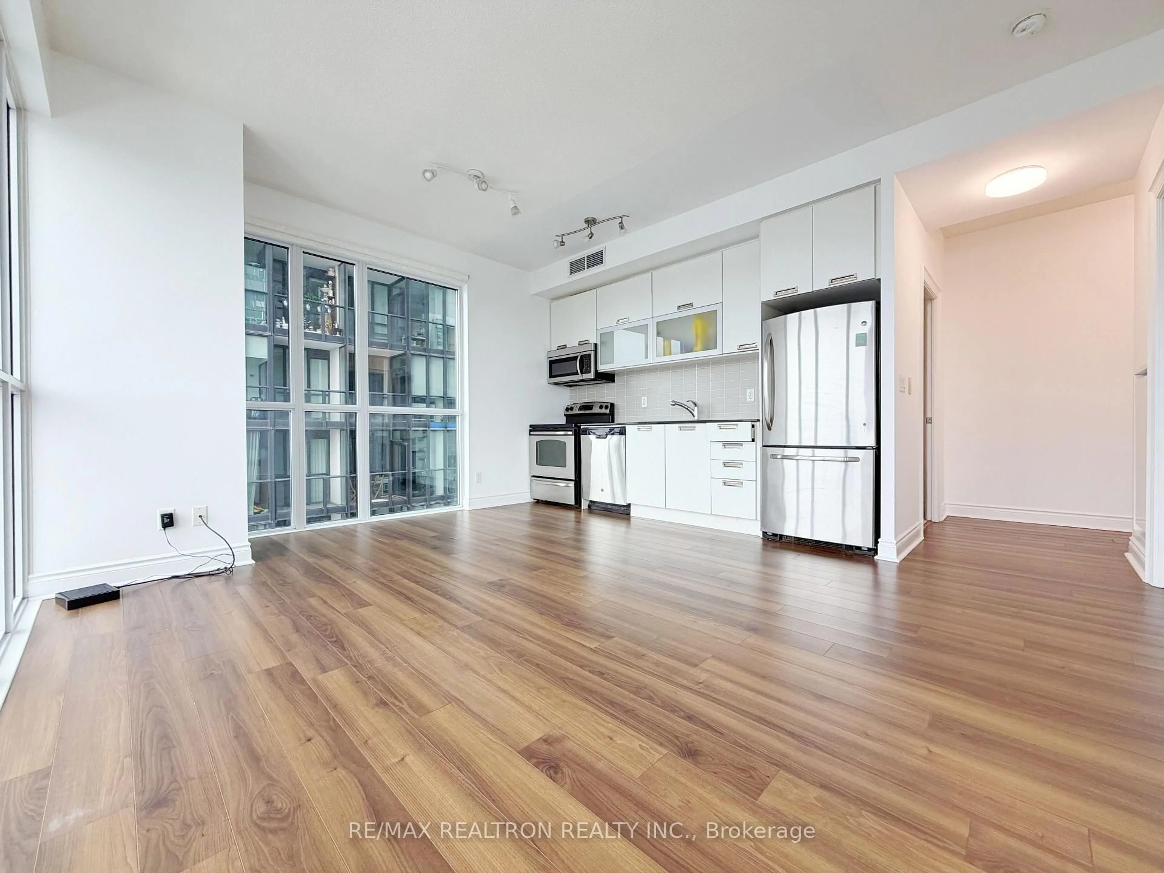 Open concept kitchen, wood/laminate floor for 28 Ted Rogers Way #3602, Toronto Ontario M4Y 2J4