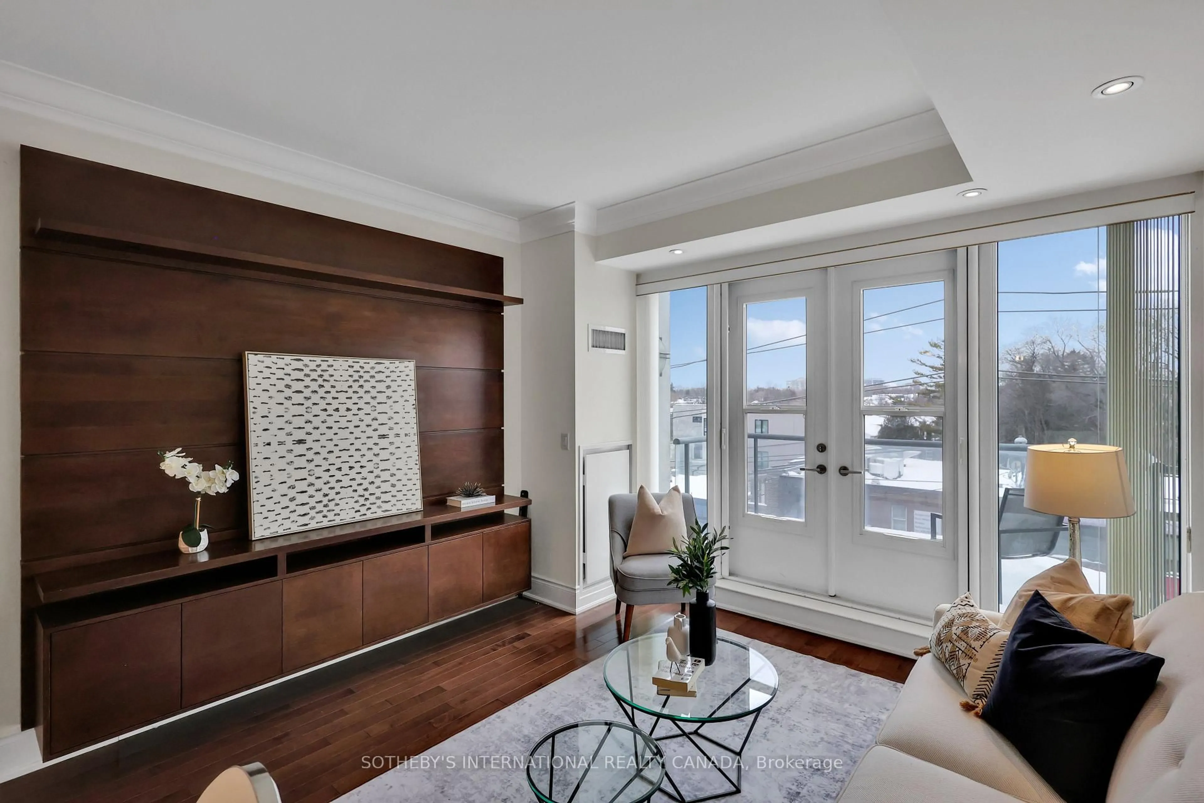 Living room with furniture, wood/laminate floor for 1717 Avenue Rd #410, Toronto Ontario M5M 0A2