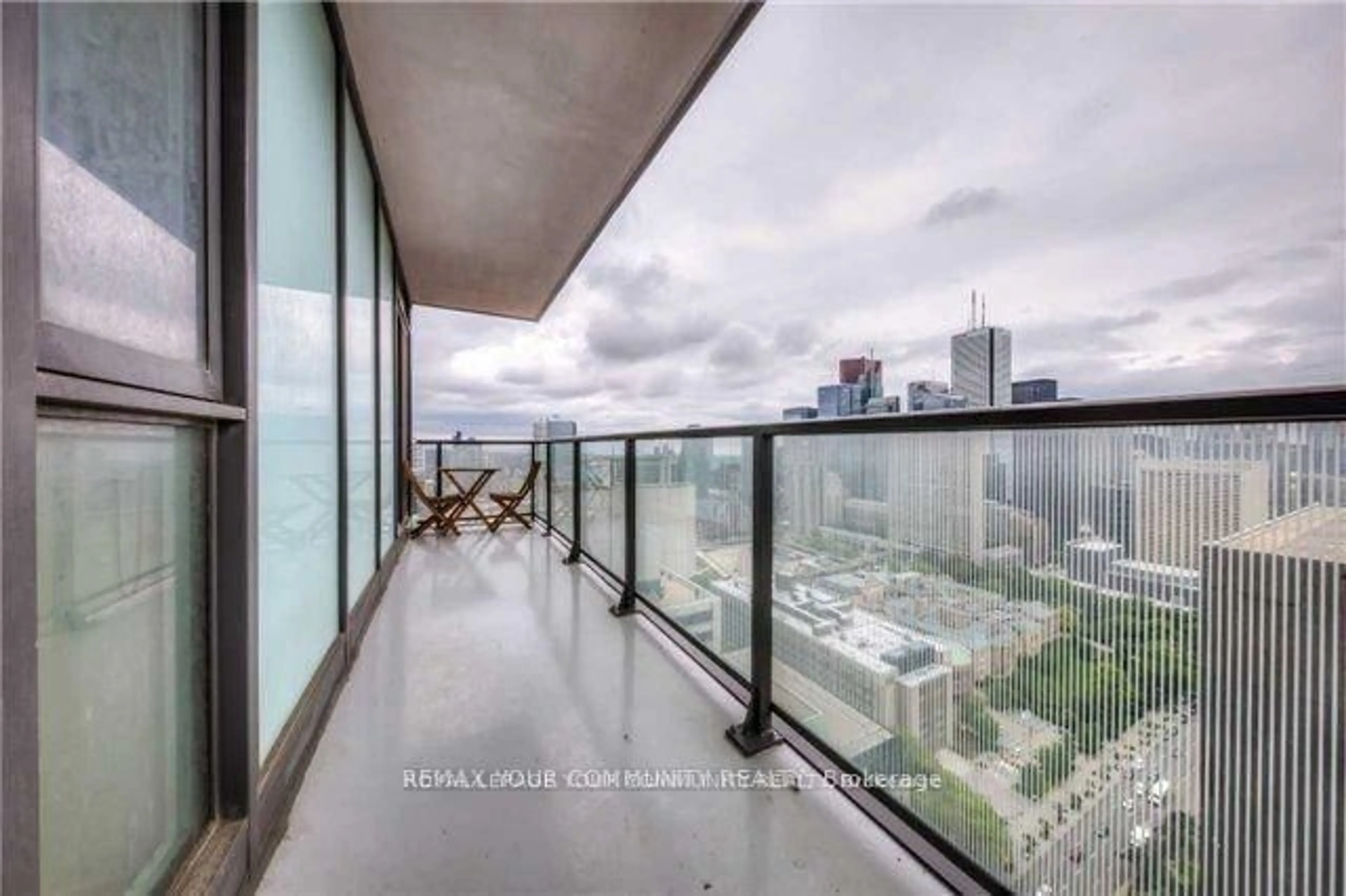 Balcony in the apartment, city buildings view from balcony for 426 University Ave #3608, Toronto Ontario M5G 1S9