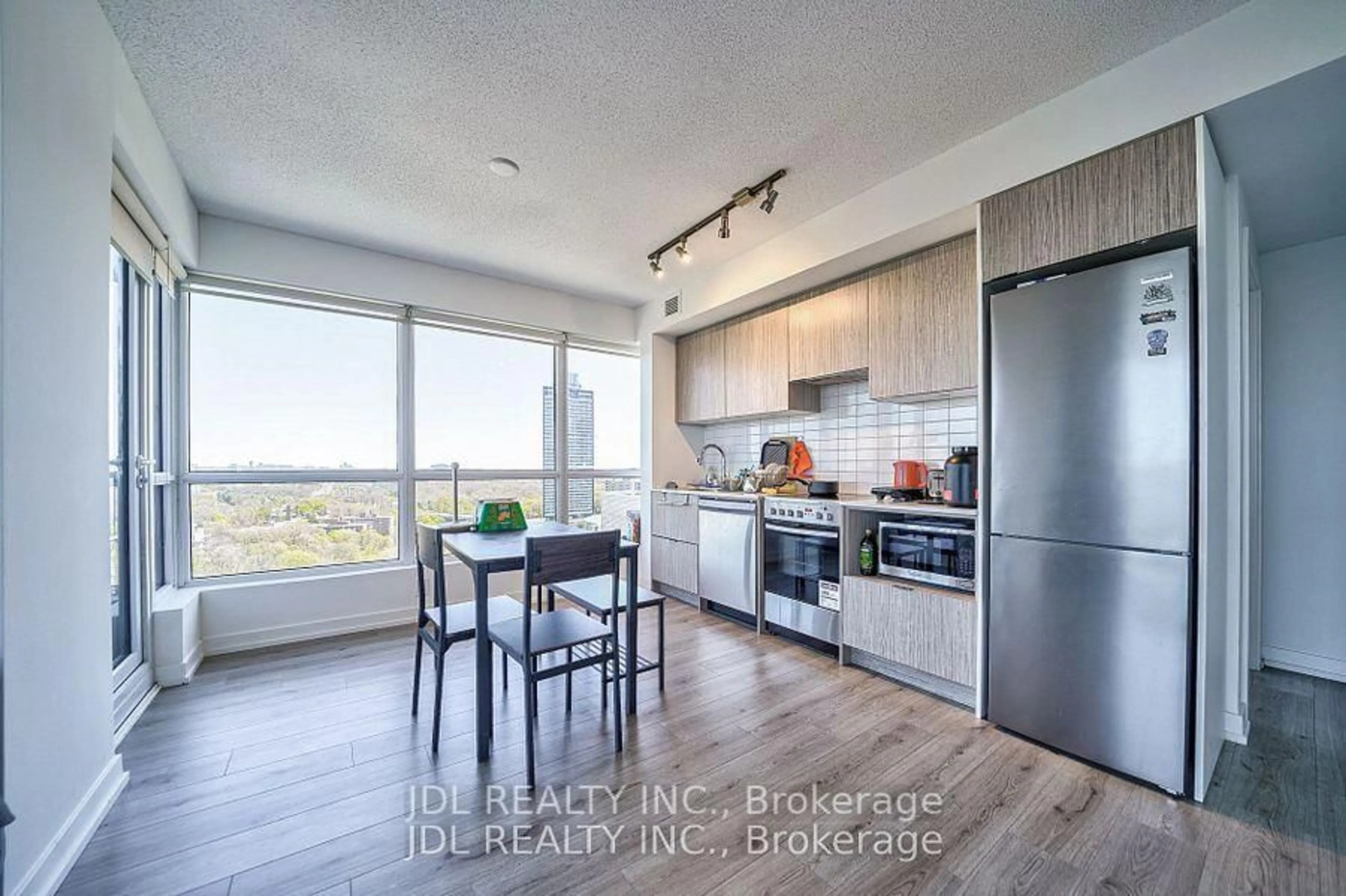 Open concept kitchen, wood/laminate floor for 395 Bloor St #1608, Toronto Ontario M4W 0B4