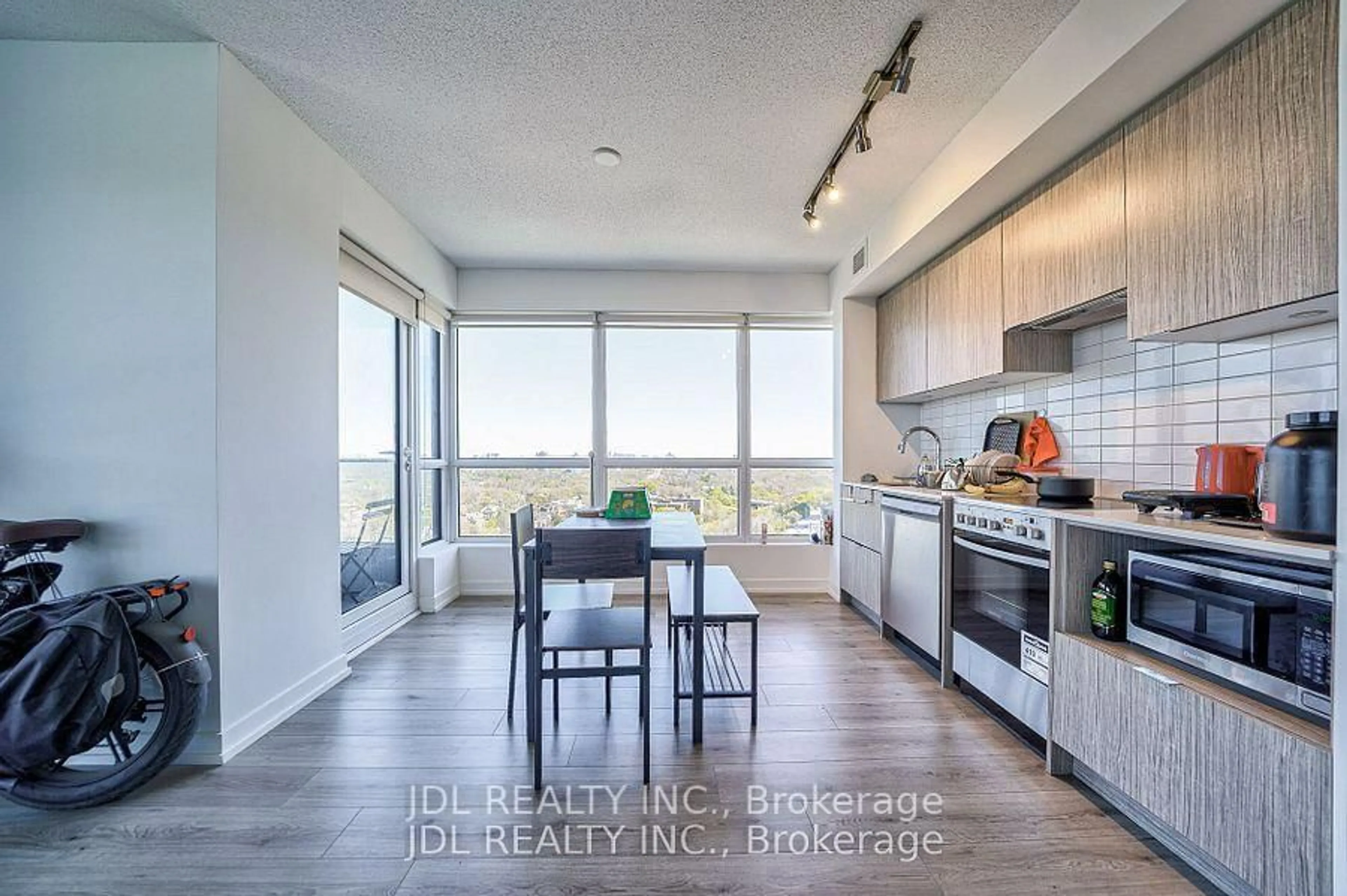 Open concept kitchen, wood/laminate floor for 395 Bloor St #1608, Toronto Ontario M4W 0B4