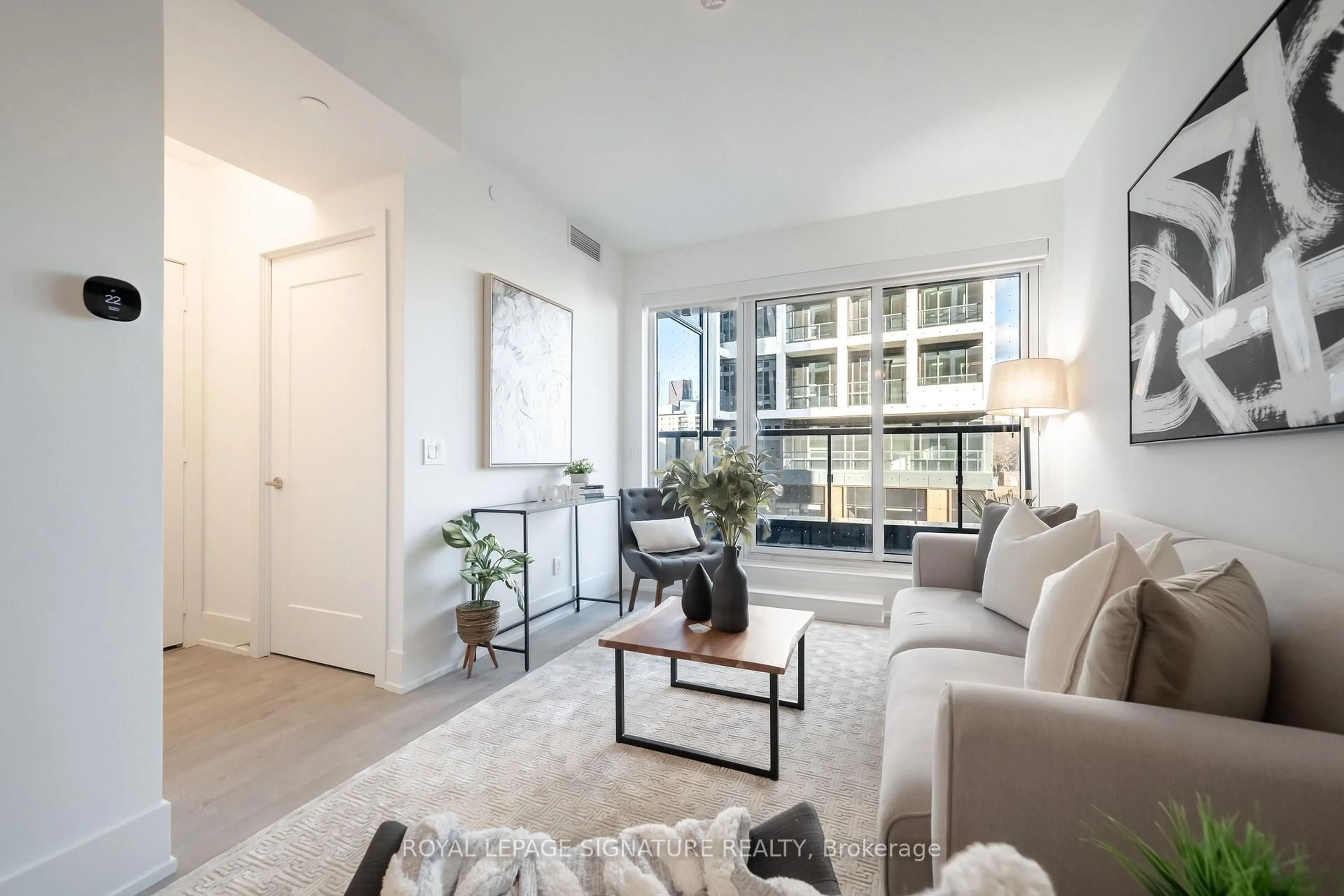 Living room with furniture, unknown for 115 Denison Ave #303, Toronto Ontario M5T 2N1