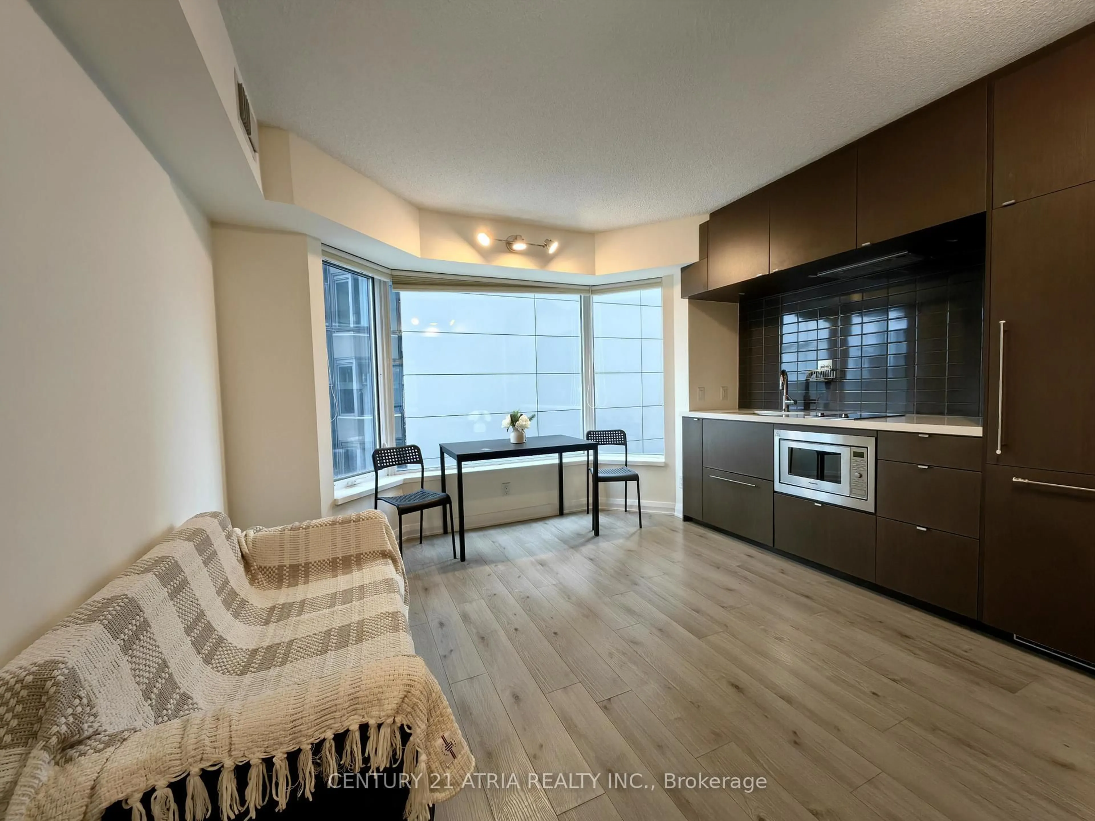 Living room with furniture, unknown for 155 Yorkville Ave #605, Toronto Ontario M5R 0B4