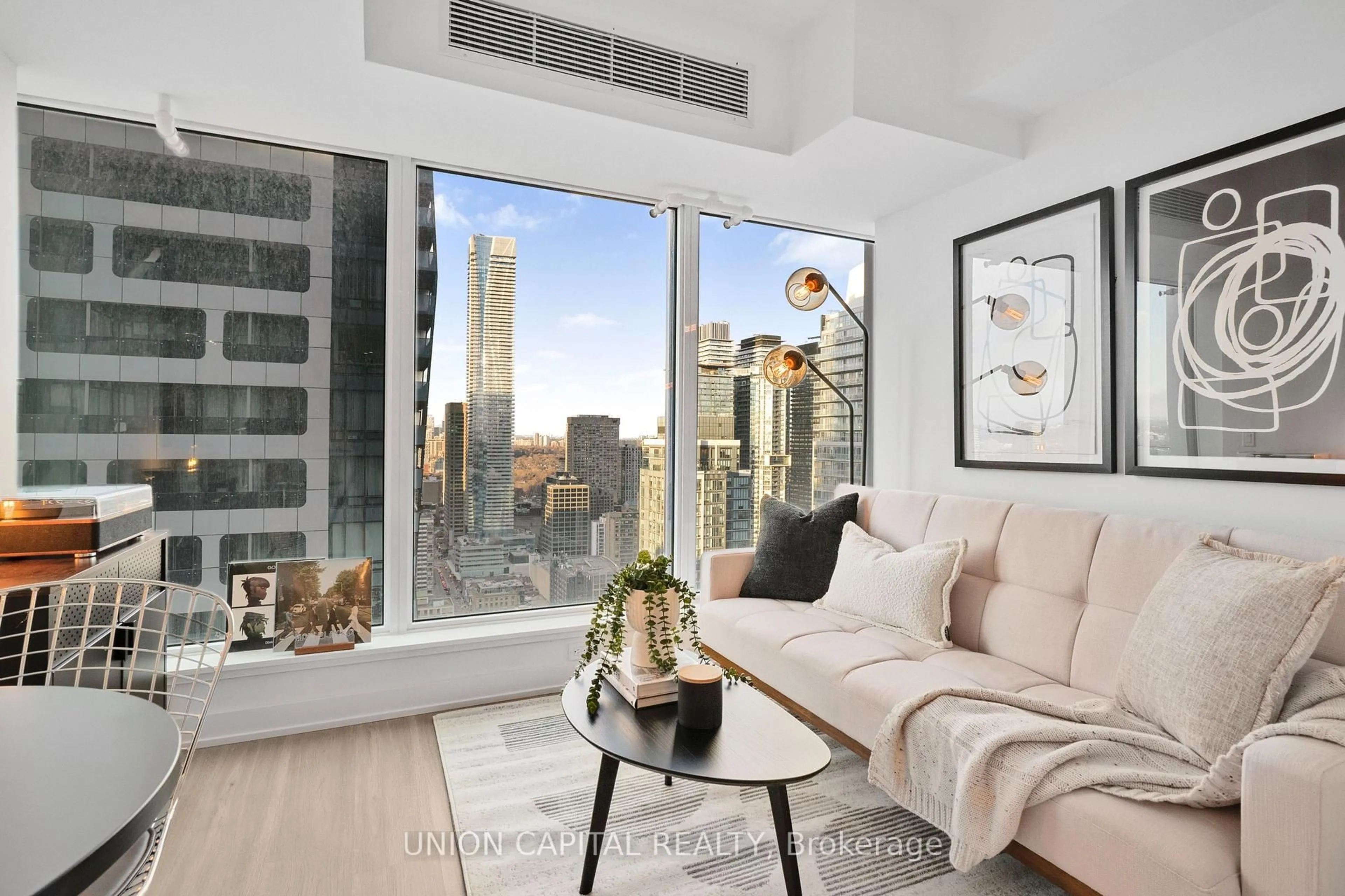 Living room with furniture, unknown for 8 Wellesley St #4308, Toronto Ontario M4Y 0J5