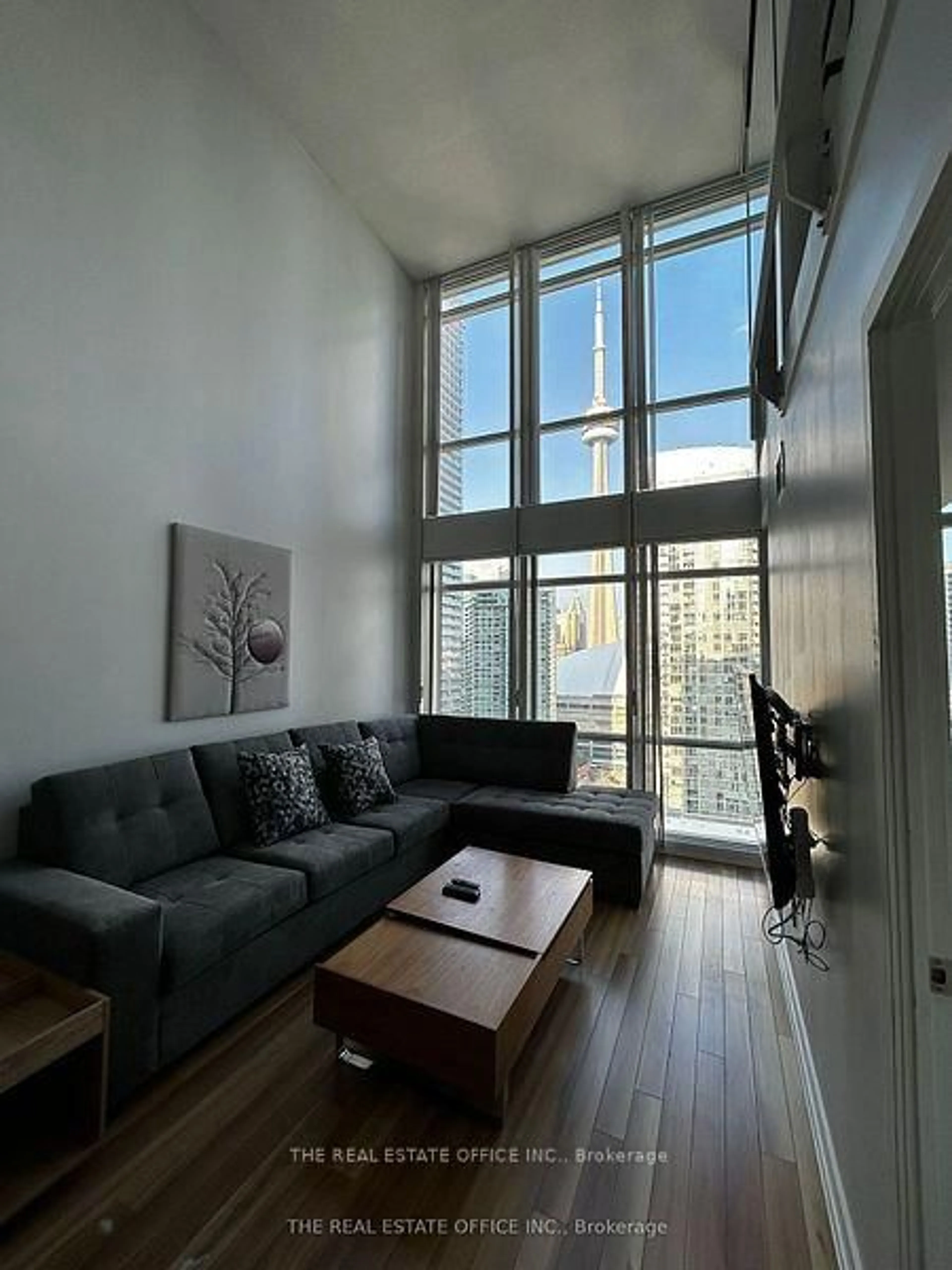 Living room with furniture, unknown for 15 Fort York Blvd #2808, Toronto Ontario M5V 3Y4