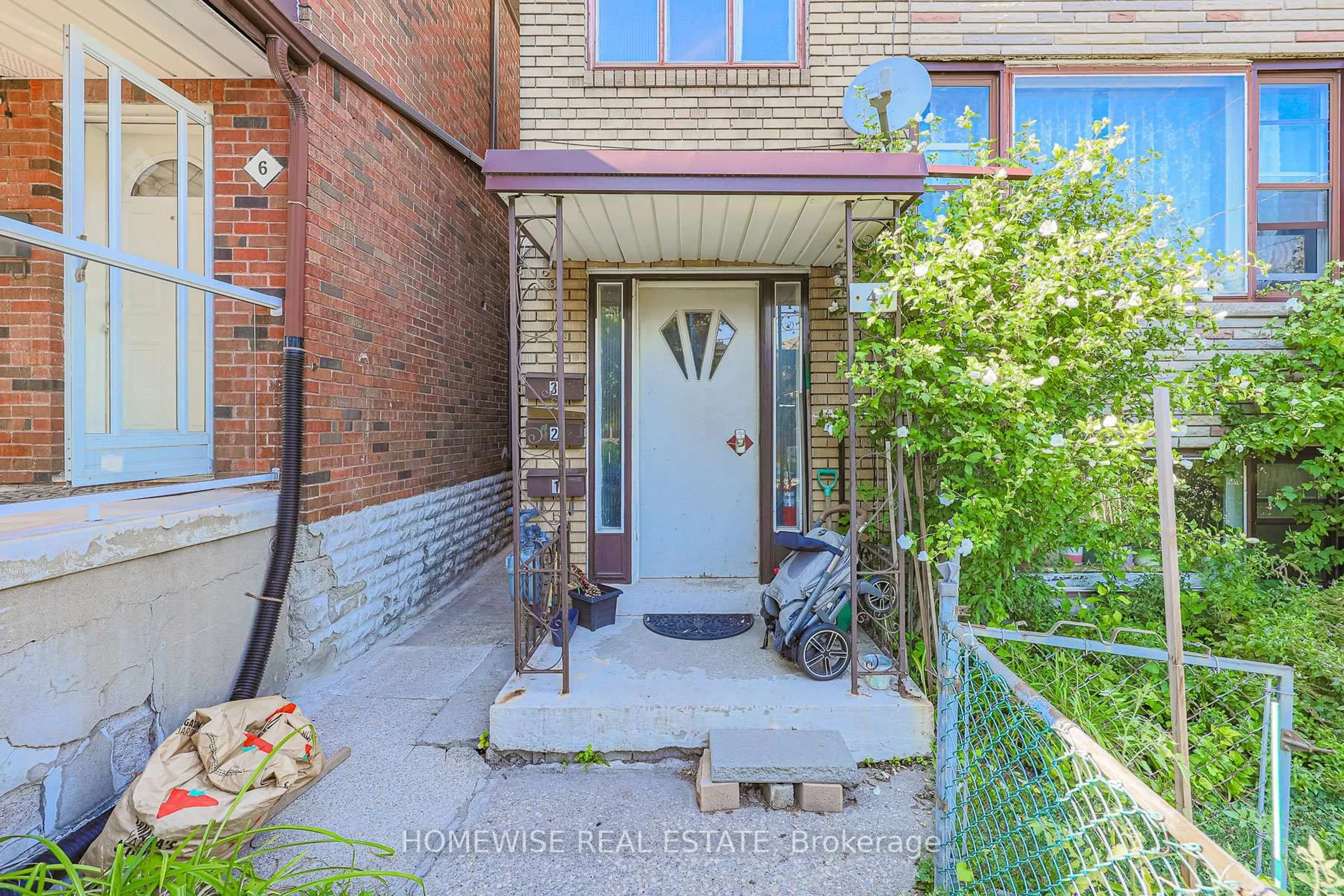 Home with brick exterior material, street for 4 Lanark Ave, Toronto Ontario M6C 2B3