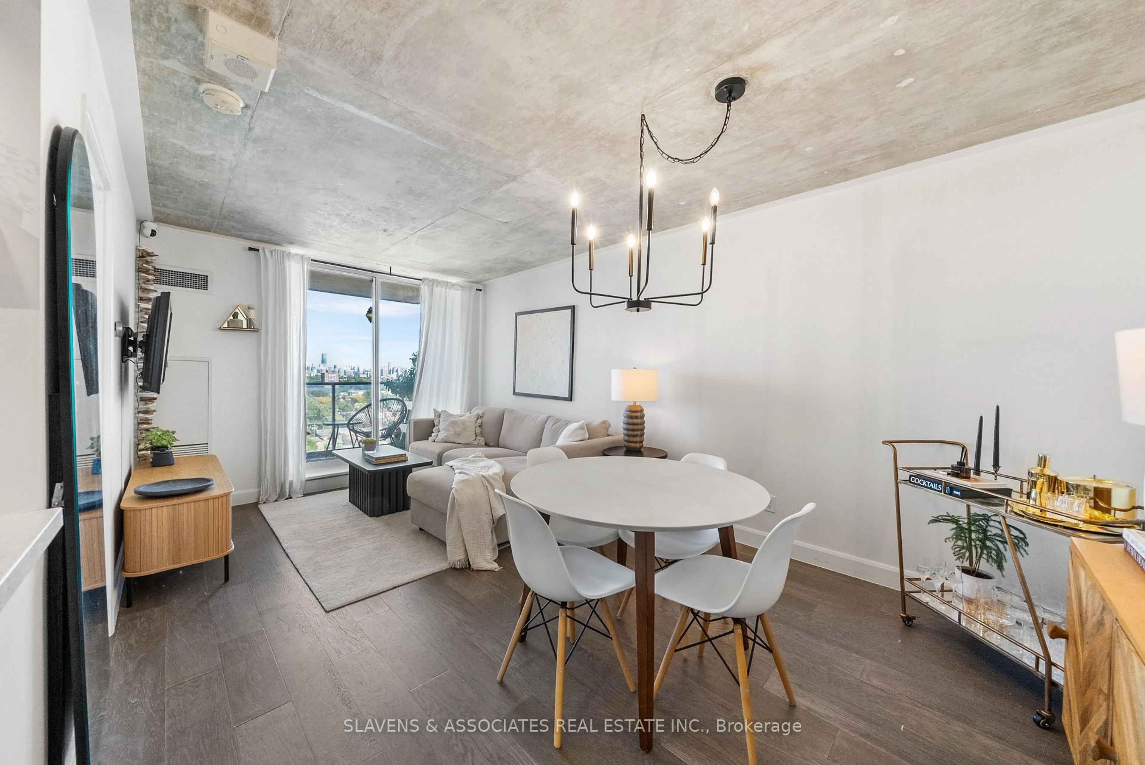 Living room with furniture, cement floor for 1369 Bloor St #1402, Toronto Ontario M6P 4J4