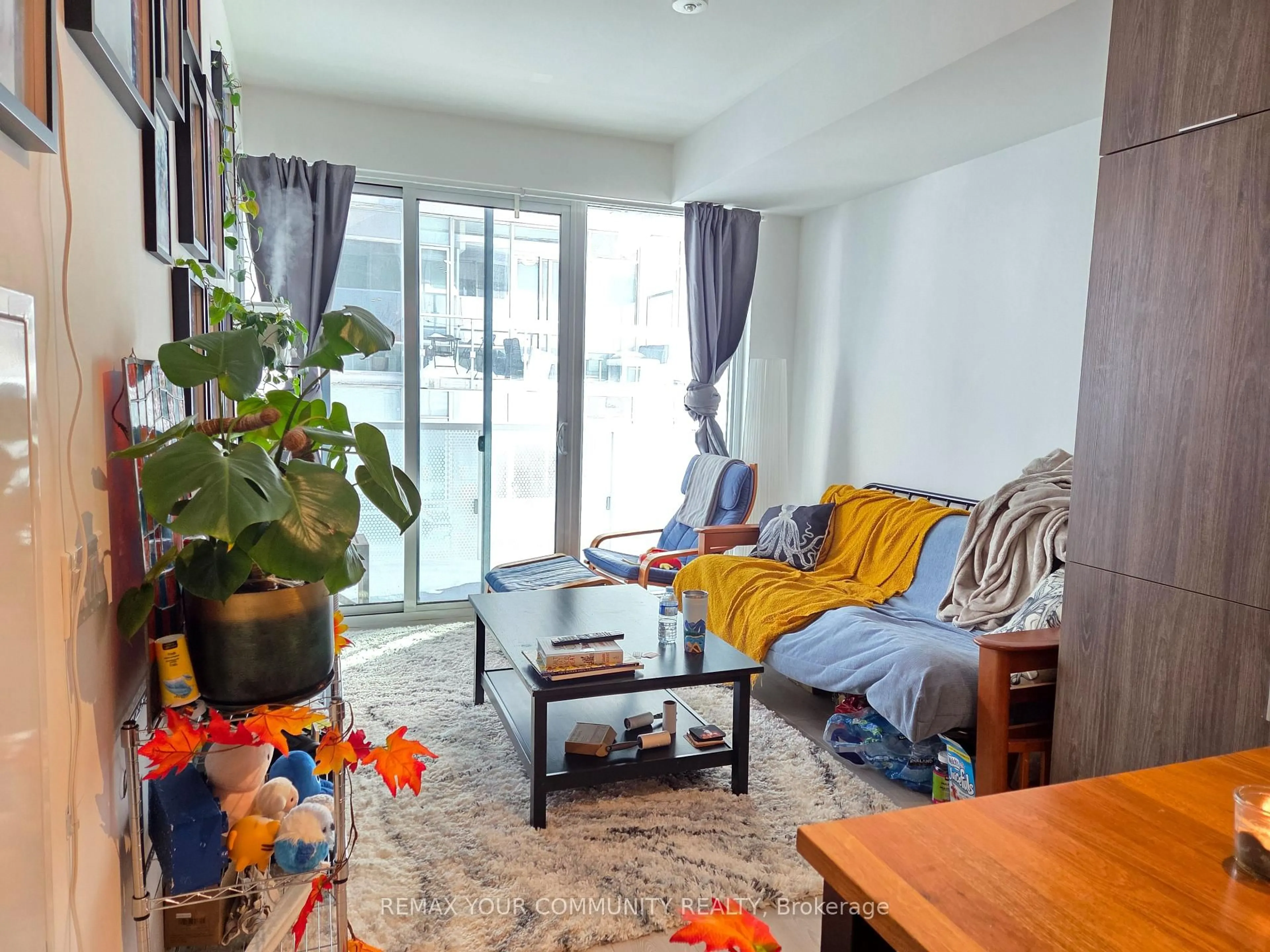 Living room with furniture, unknown for 15 Queens Quay #408, Toronto Ontario M5E 0C5