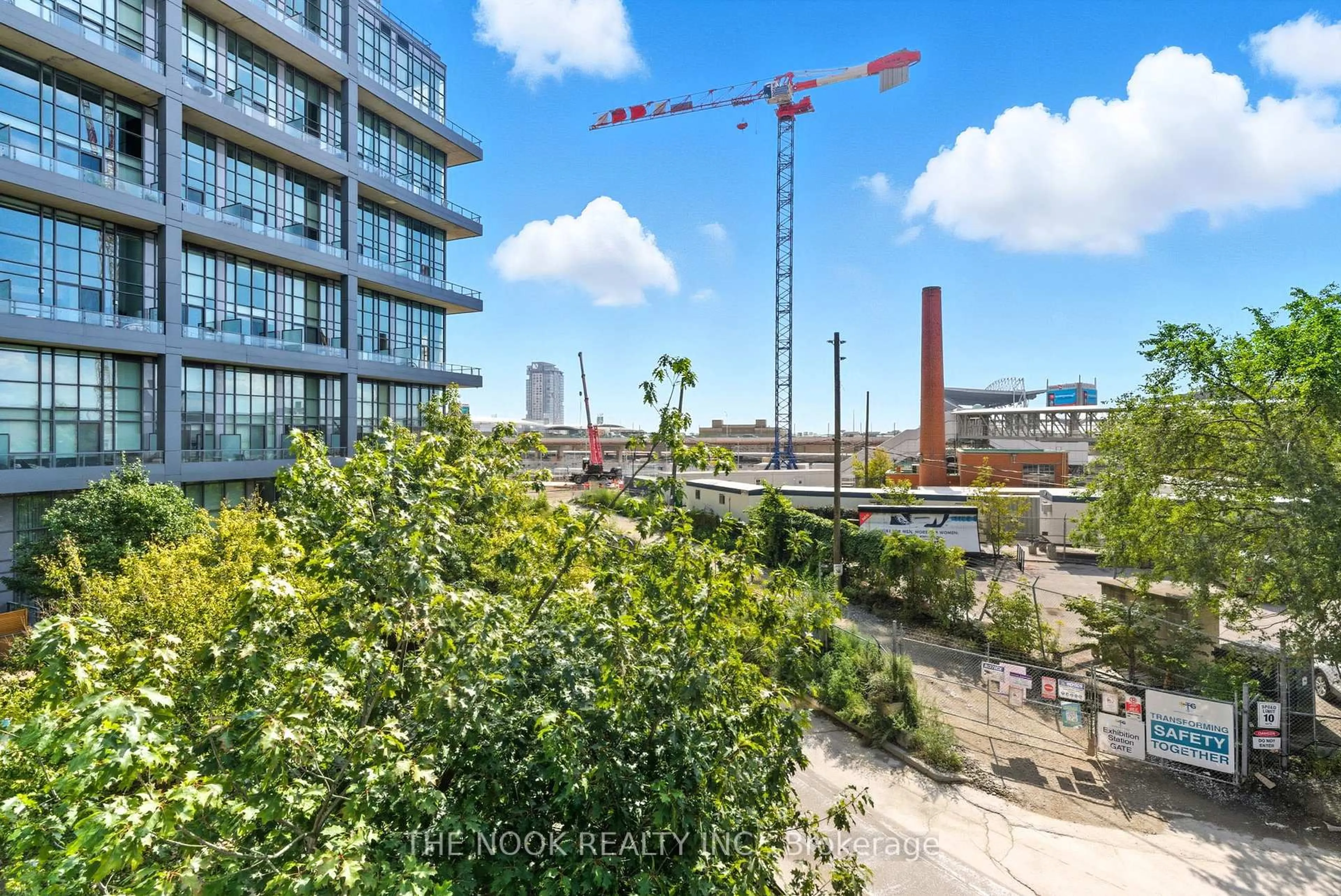 A pic from outside/outdoor area/front of a property/back of a property/a pic from drone, city buildings view from balcony for 5 Hanna Ave #309, Toronto Ontario M6K 0B3