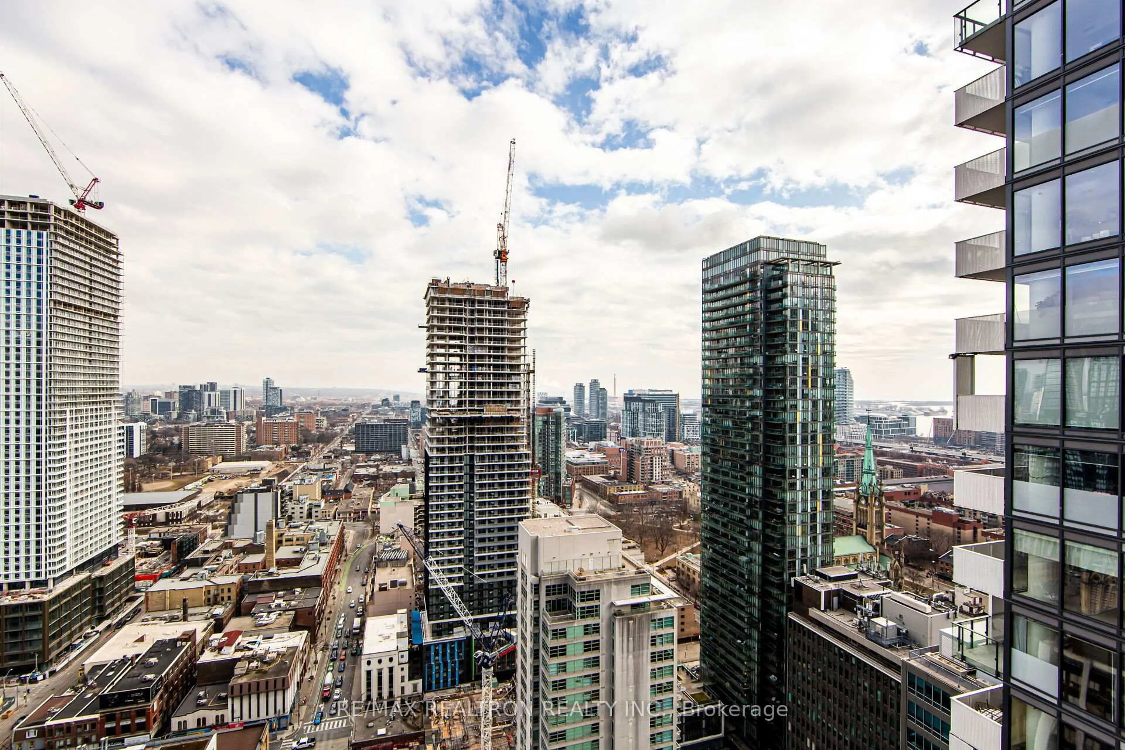 A pic from outside/outdoor area/front of a property/back of a property/a pic from drone, city buildings view from balcony for 25 Richmond St #3216, Toronto Ontario M5C 0A6