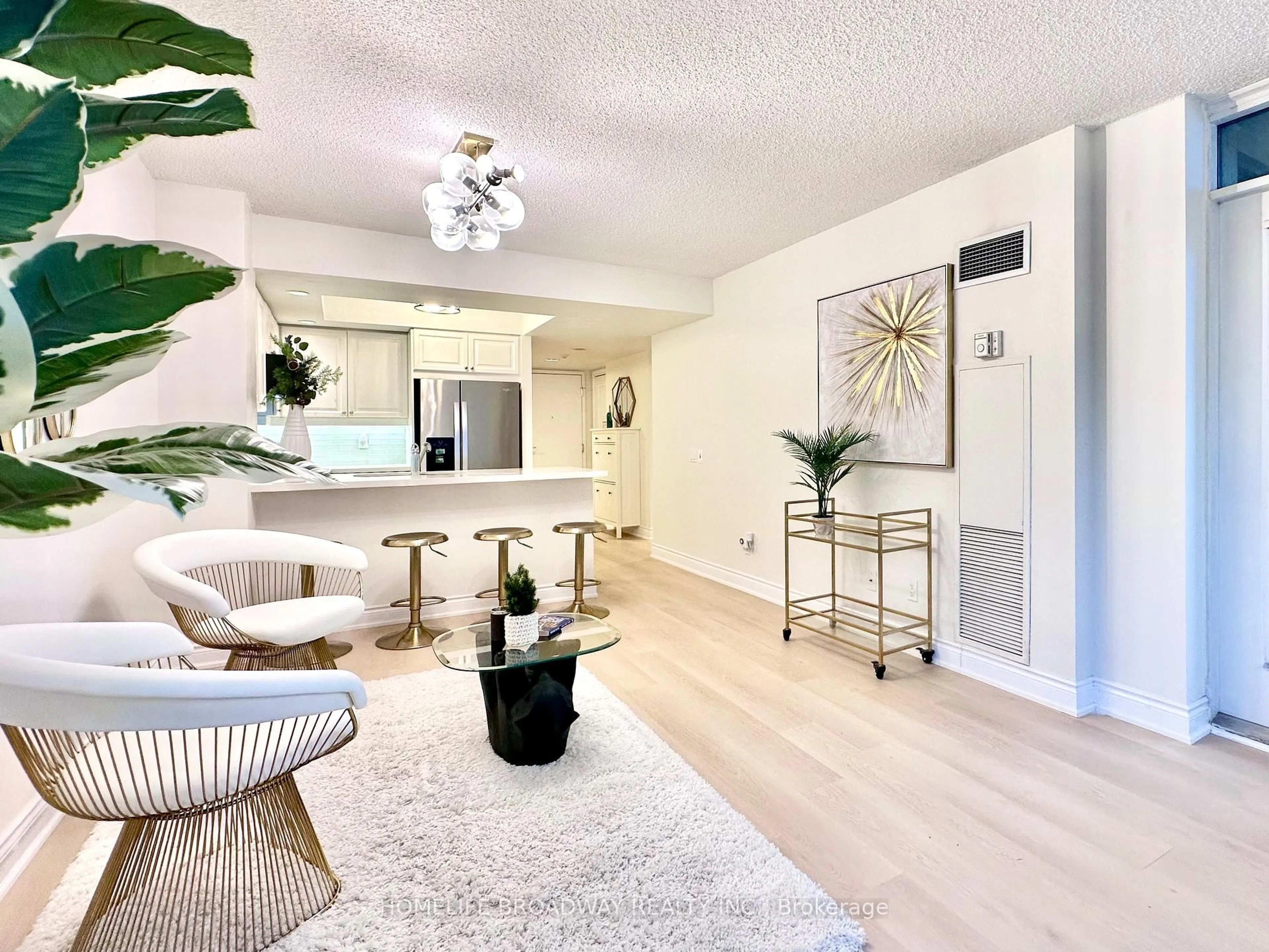 Living room with furniture, wood/laminate floor for 15 Northtown Way #521, Toronto Ontario M2N 7A2