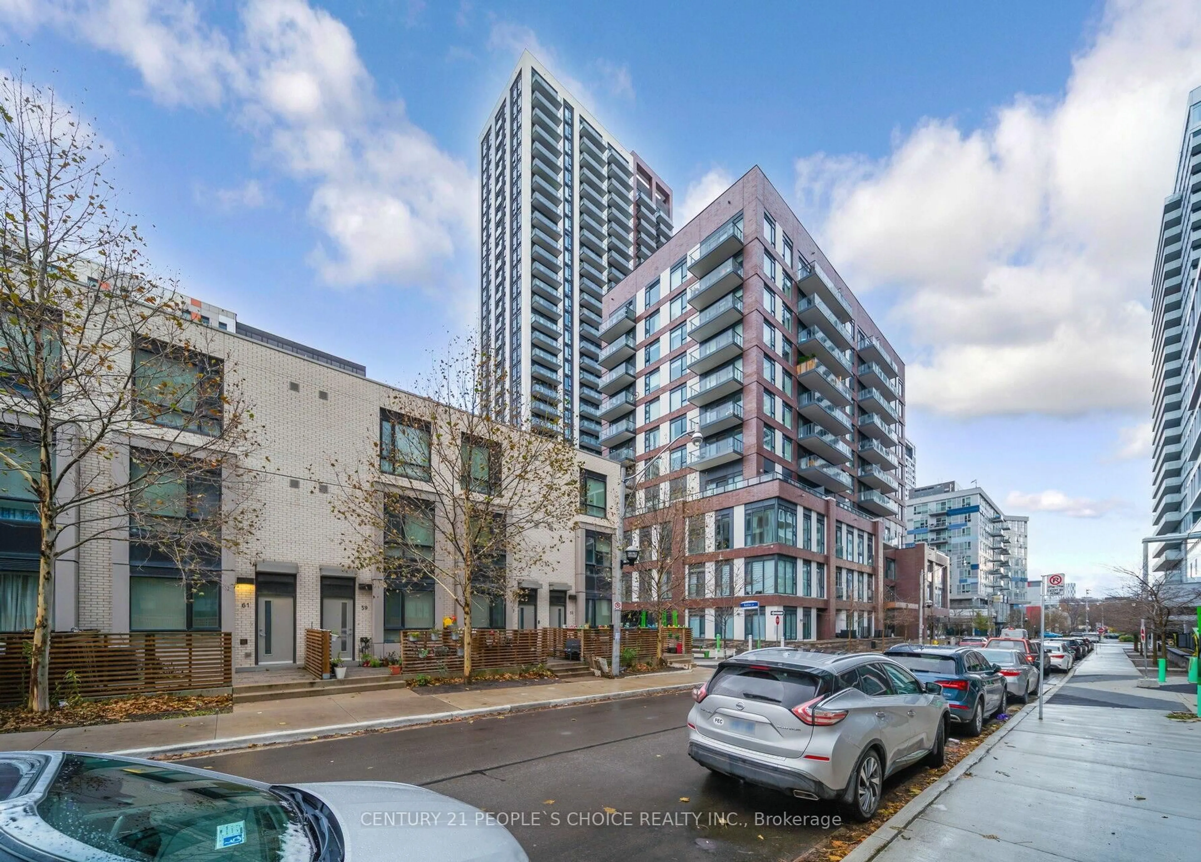 A pic from outside/outdoor area/front of a property/back of a property/a pic from drone, street for 35 Tubman Ave #323, Toronto Ontario M5A 0T1