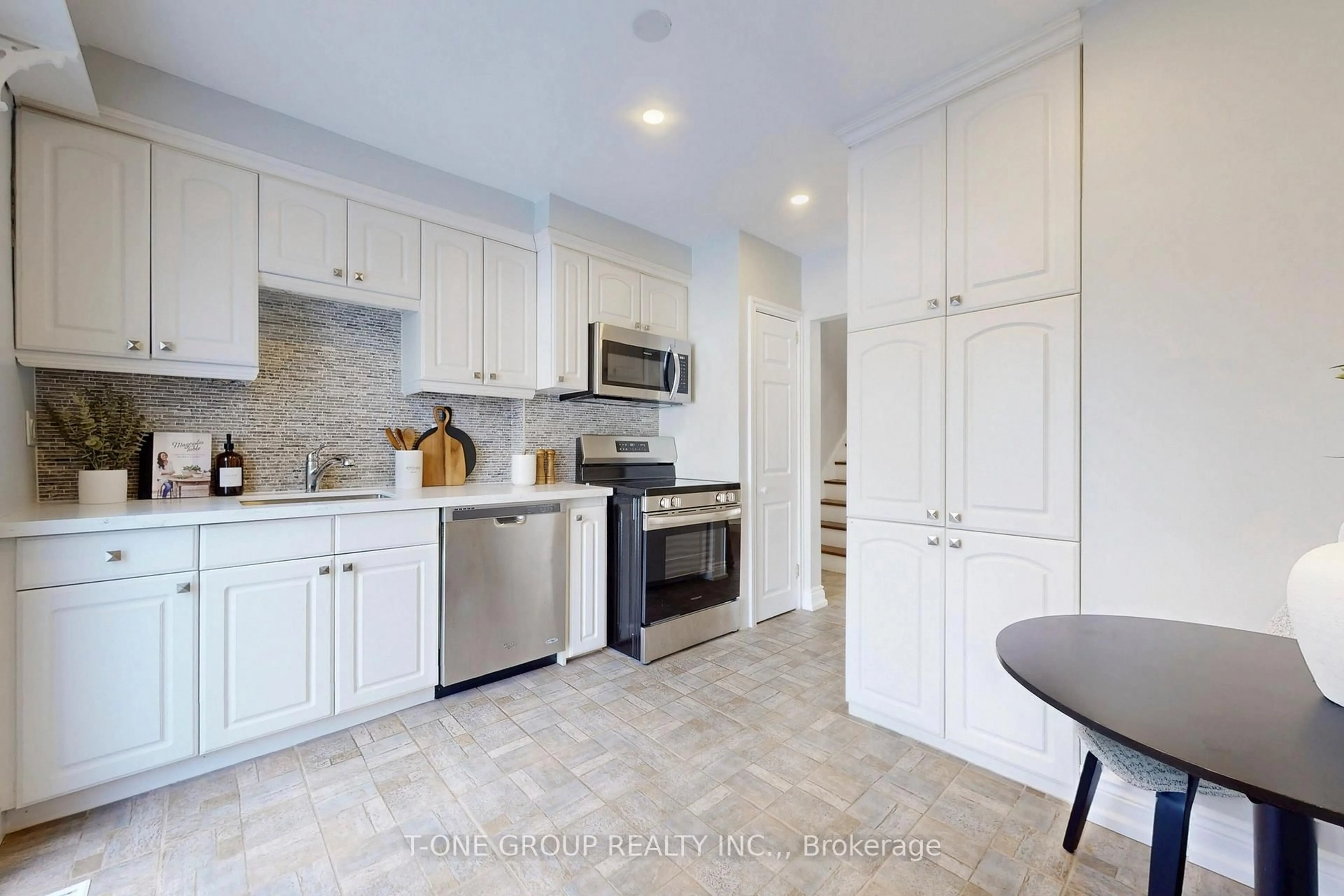 Open concept kitchen, ceramic/tile floor for 26 Balaby Cres, Toronto Ontario M3C 2B7