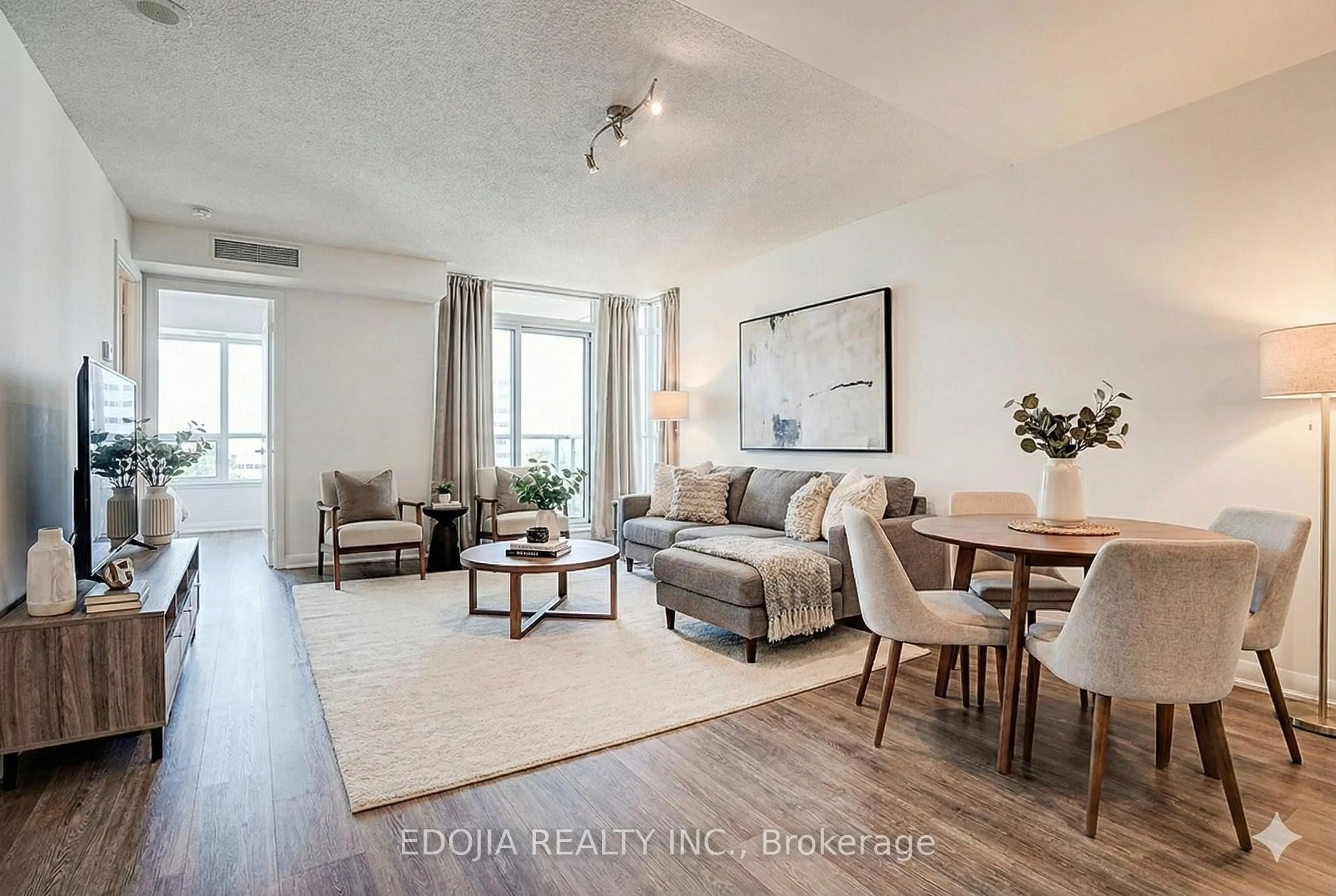Living room with furniture, wood/laminate floor for 17 Anndale Dr #1617, Toronto Ontario M2N 2W7