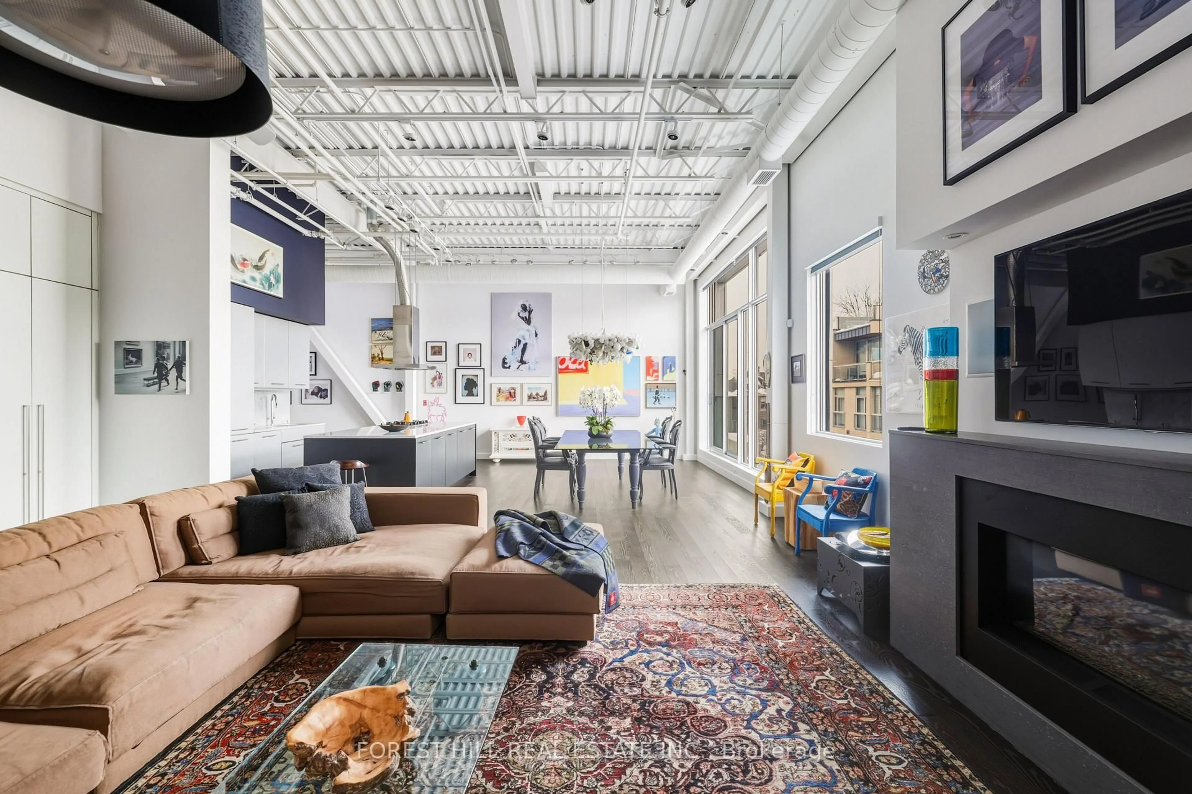 Living room with furniture, cement floor for 113 Dupont St #301, Toronto Ontario M5R 1V4